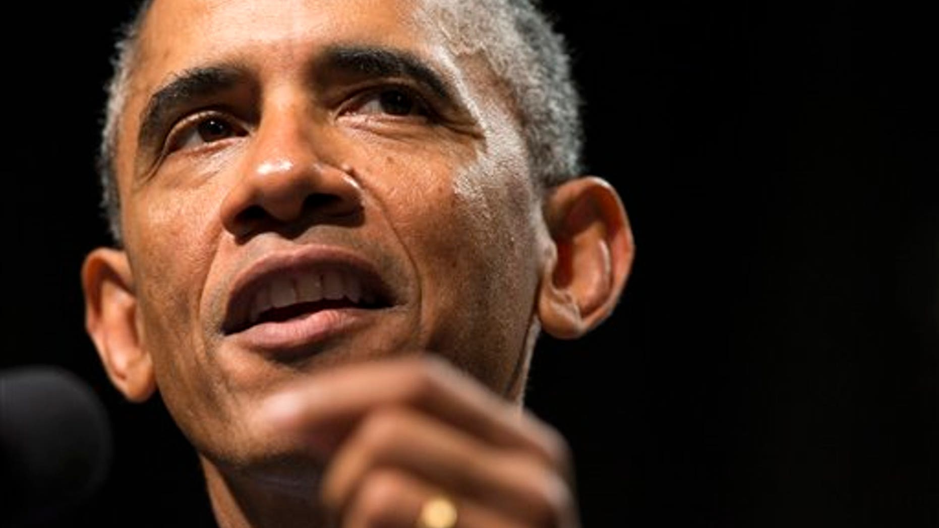 President Barack Obama speaks about the economy, Thursday, Oct. 2, 2014, at Northwestern University in Evanston, Ill. Obama is looking to frame the closing economic arguments of the midterm campaign. (AP Photo/Evan Vucci)