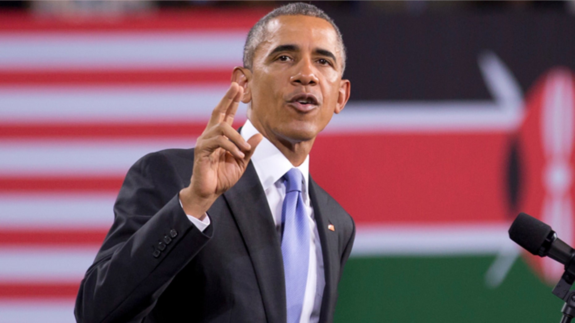 July 26, 2015: President Barack Obama delivers a speech, in front of American and Kenyan flags, at the Safaricom Indoor Arena in the Kasarani area of Nairobi, Kenya. Obama is traveling on a two-nation African tour where he will become the first sitting U.S. president to visit Kenya and Ethiopia.