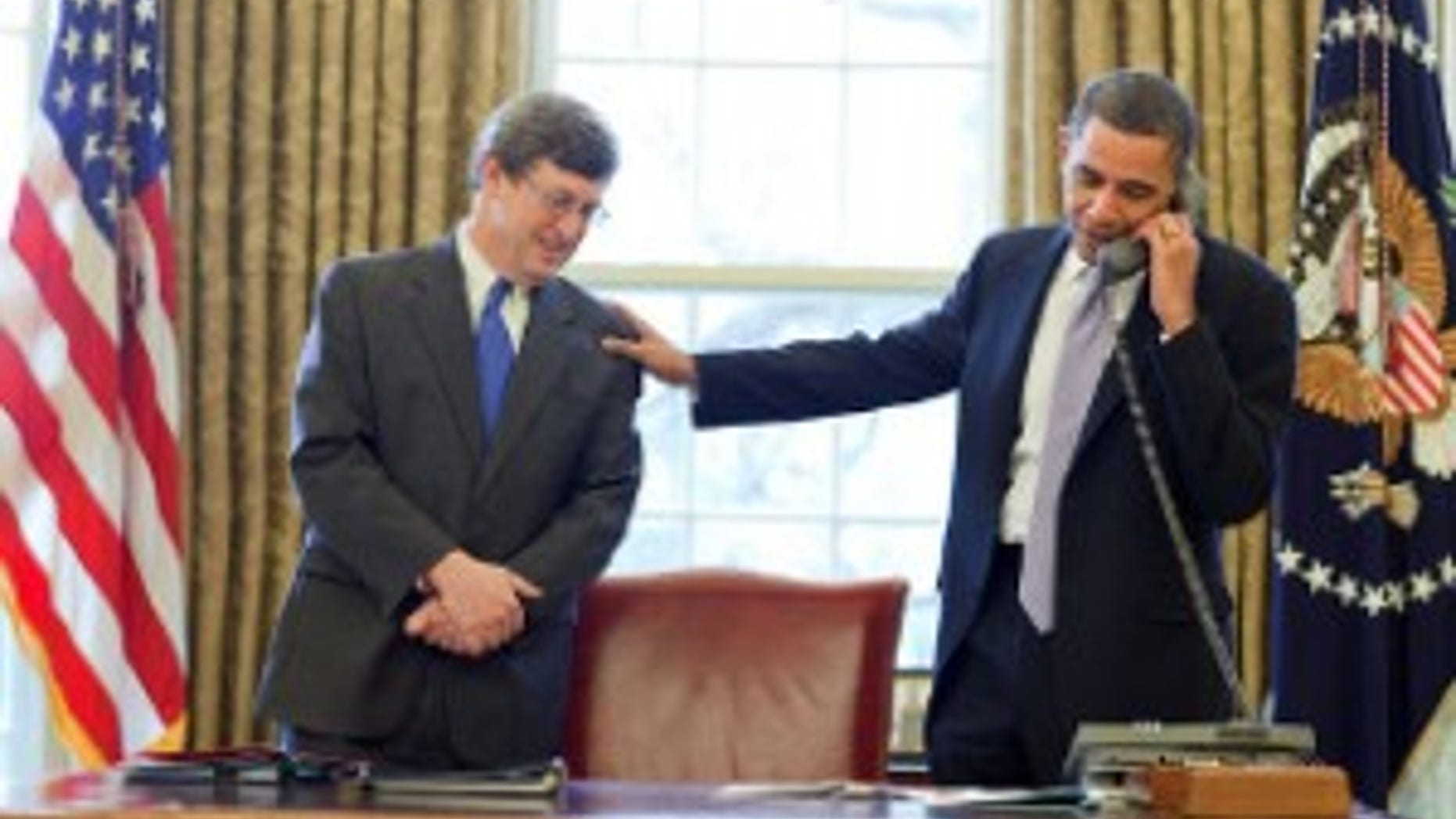 The President and Rep. Ben Chandler call the University of Kentucky men's basketball team to thank them for raising over $1m to help relief efforts in Haiti. (WH Photo)