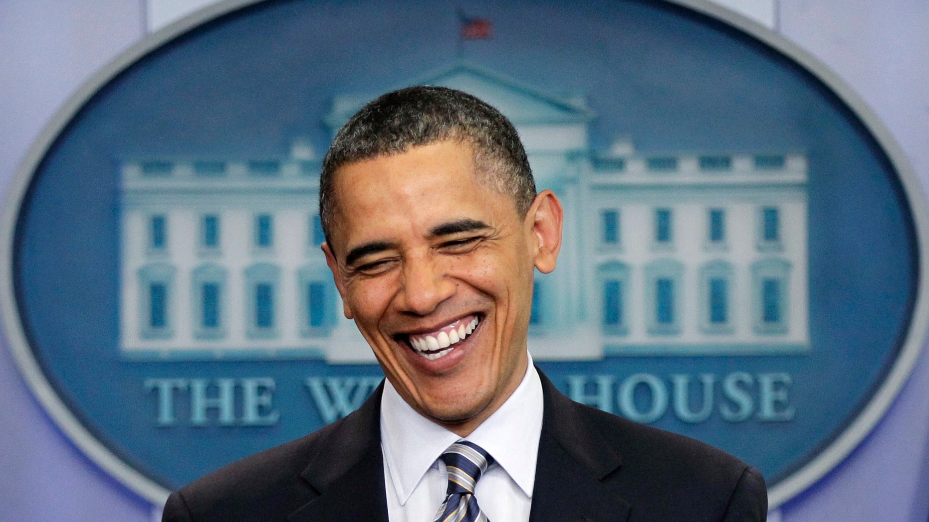 In this April 27, 2011, file photo President Obama laughs as comments to reporters on the controversy over his birth certificate and true nationality in the White House briefing room in Washington. (AP)