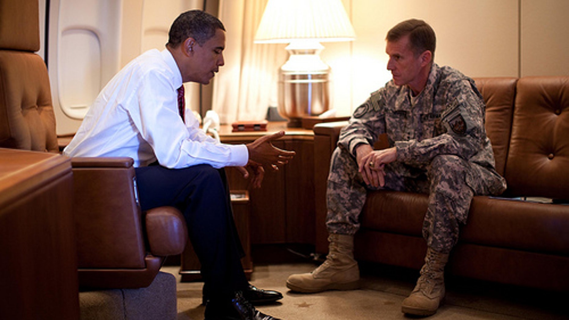 President Barack Obama meets with Army Gen. Stanley McChrystal, the Commander of U.S. Forces in Afghanistan, aboard Air Force One in Copenhagen, Denmark on Oct. 2, 2009.