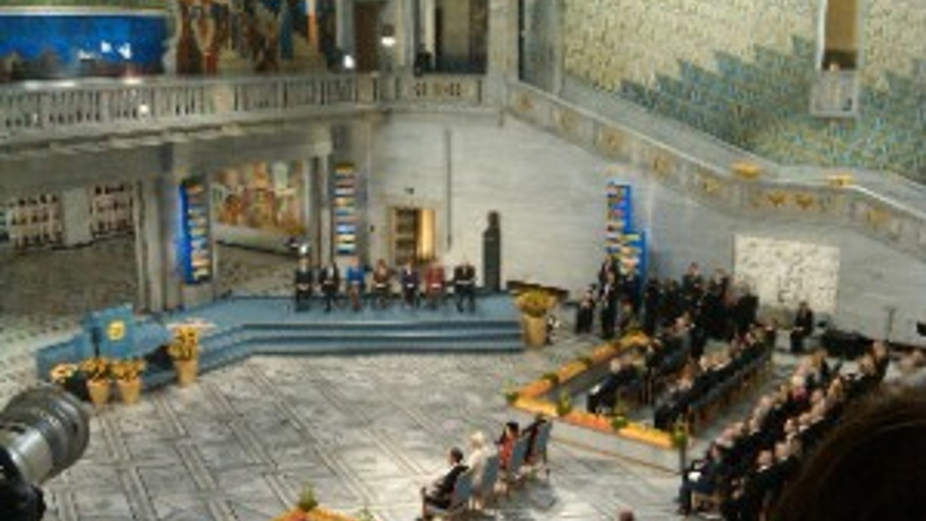 President Obama, second on the left, at the Nobel Prize Ceremony (Photo Courtesy of Travel Pool/Anne McGinn)