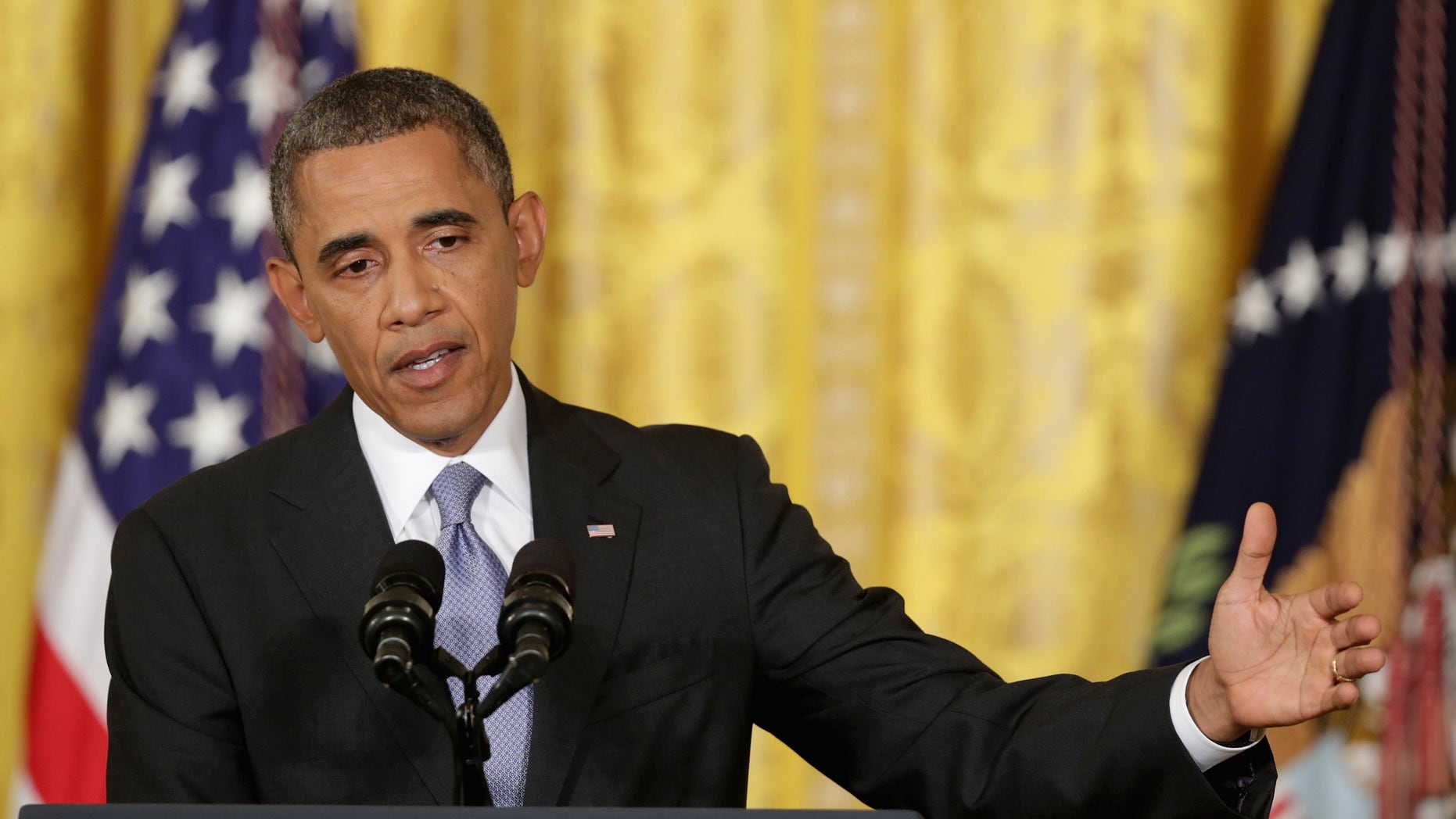 WASHINGTON, DC - AUGUST 09: U.S. President Barack Obama answers reporters' questions during a news conference in the East Room of the White House August 9, 2013 in Washington, DC. Obama began the news conference by announcing the release of new details about the National Security Agency's surveillance programs while outlining steps to protect Americans' privacy and civil liberties. (Photo by Chip Somodevilla/Getty Images)