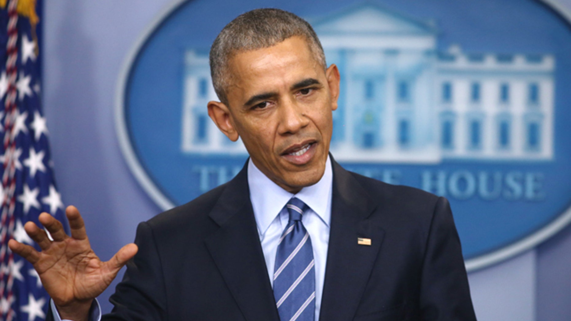 FILE -- Former President Barack Obama speaks to journalists as he participates in his last news conference of the year at the White House in Washington, U.S., December 16, 2016.