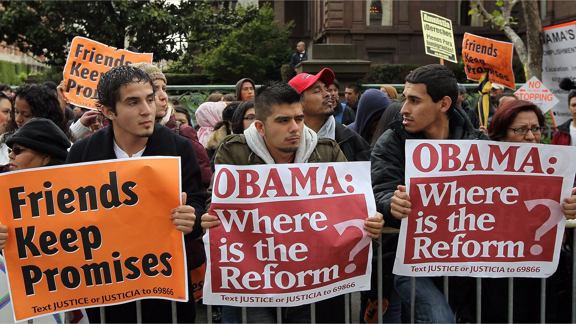 SAN FRANCISCO - MAY 25: A group carries signs asking for immigration reform as they protest outside of the Fairmont Hotel before U.S. President Barack Obama arrives for a fundraiser May 25, 2010 in San Francisco, California. Hundreds of protestors from different political groups staged the demonstration at a campaign fundraiser for U.S. Sen. Barbara Boxer (D-CA). (Photo by Justin Sullivan/Getty Images)