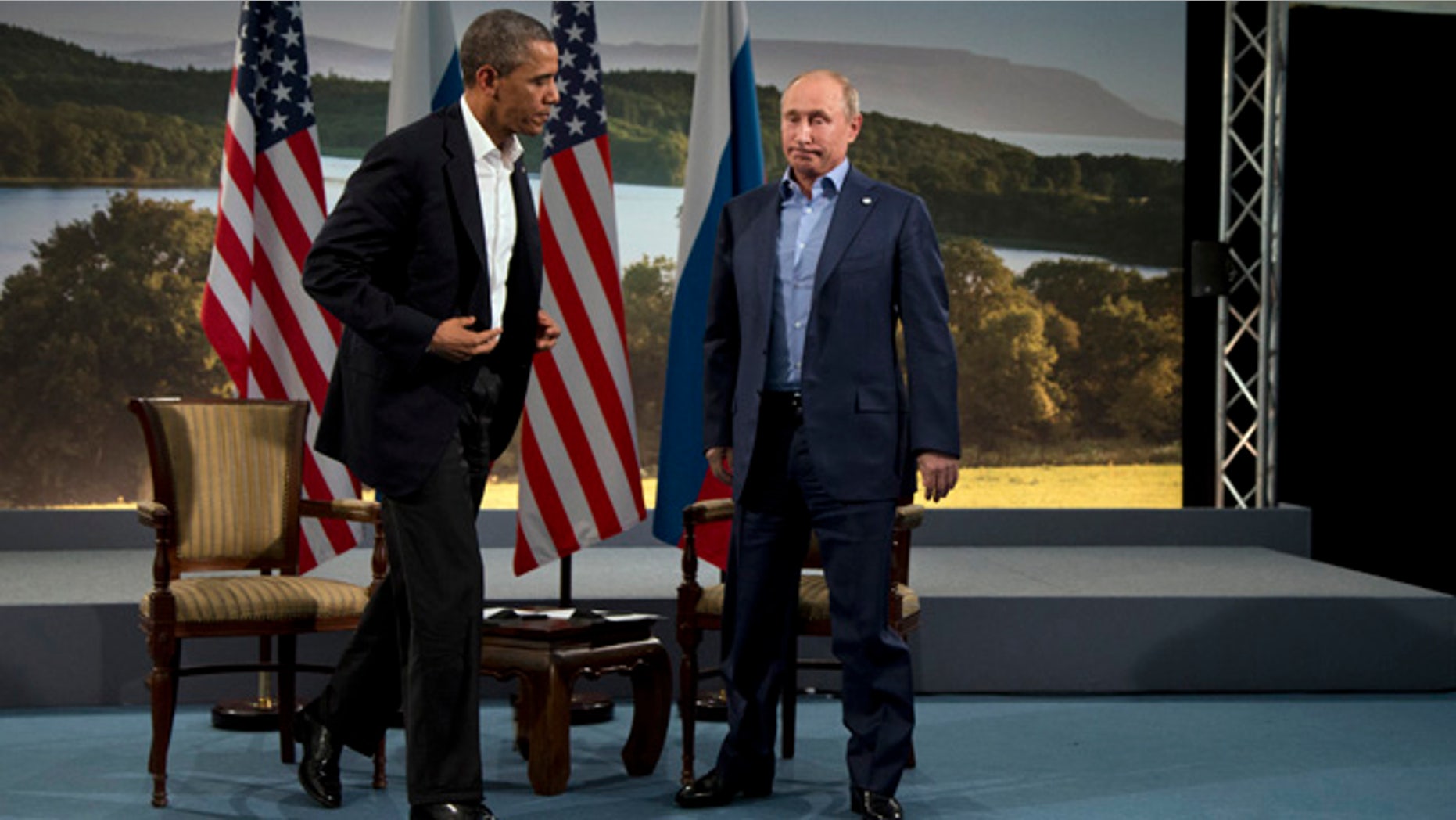 June 17, 2013. President Obama and Russian President Vladimir Putin get up to leave after their meeting in Enniskillen, Northern Ireland.