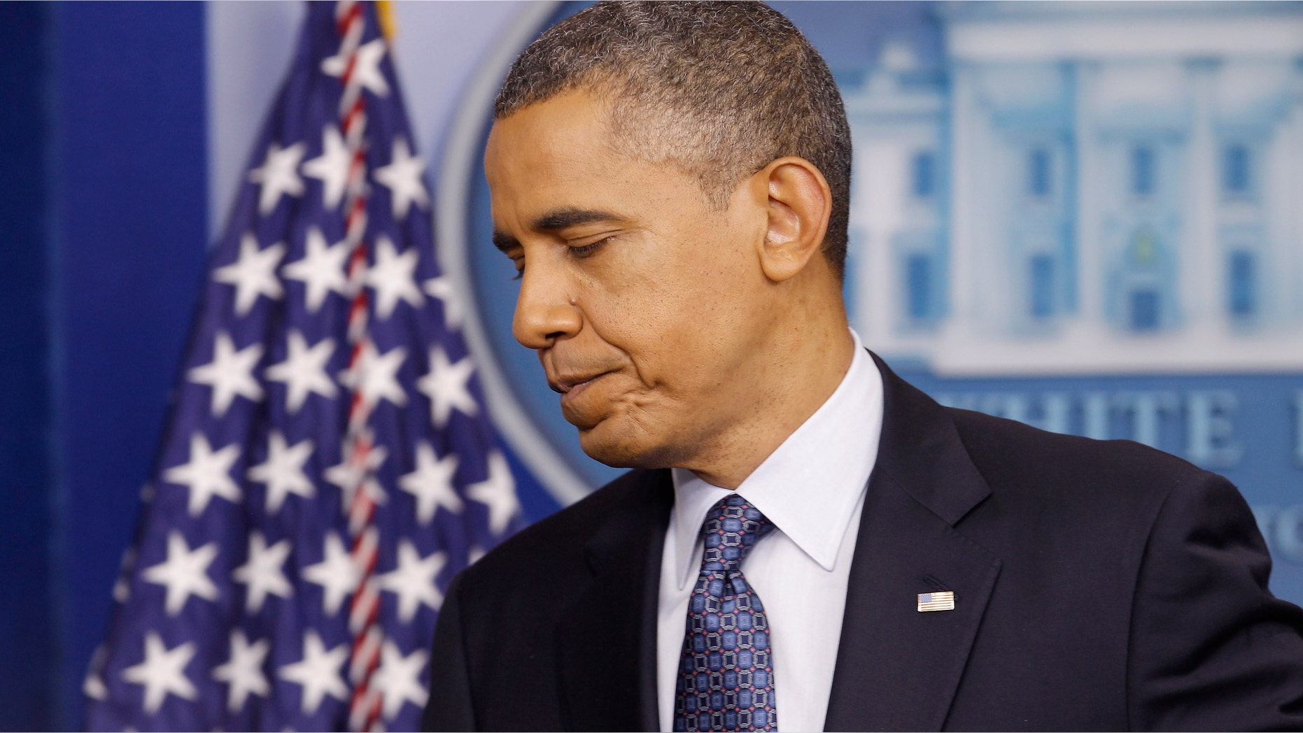 WASHINGTON, DC - JUNE 08: U.S. President Barack Obama leaves after a news conference in the Brady Press Briefing Room at the White House June 8, 2012 in Washington, DC. Obama called the last-minute announcement to talk about the domestic and international economies and encourage Congress to pass his "paid-for ideas" on job creation. (Photo by Chip Somodevilla/Getty Images)