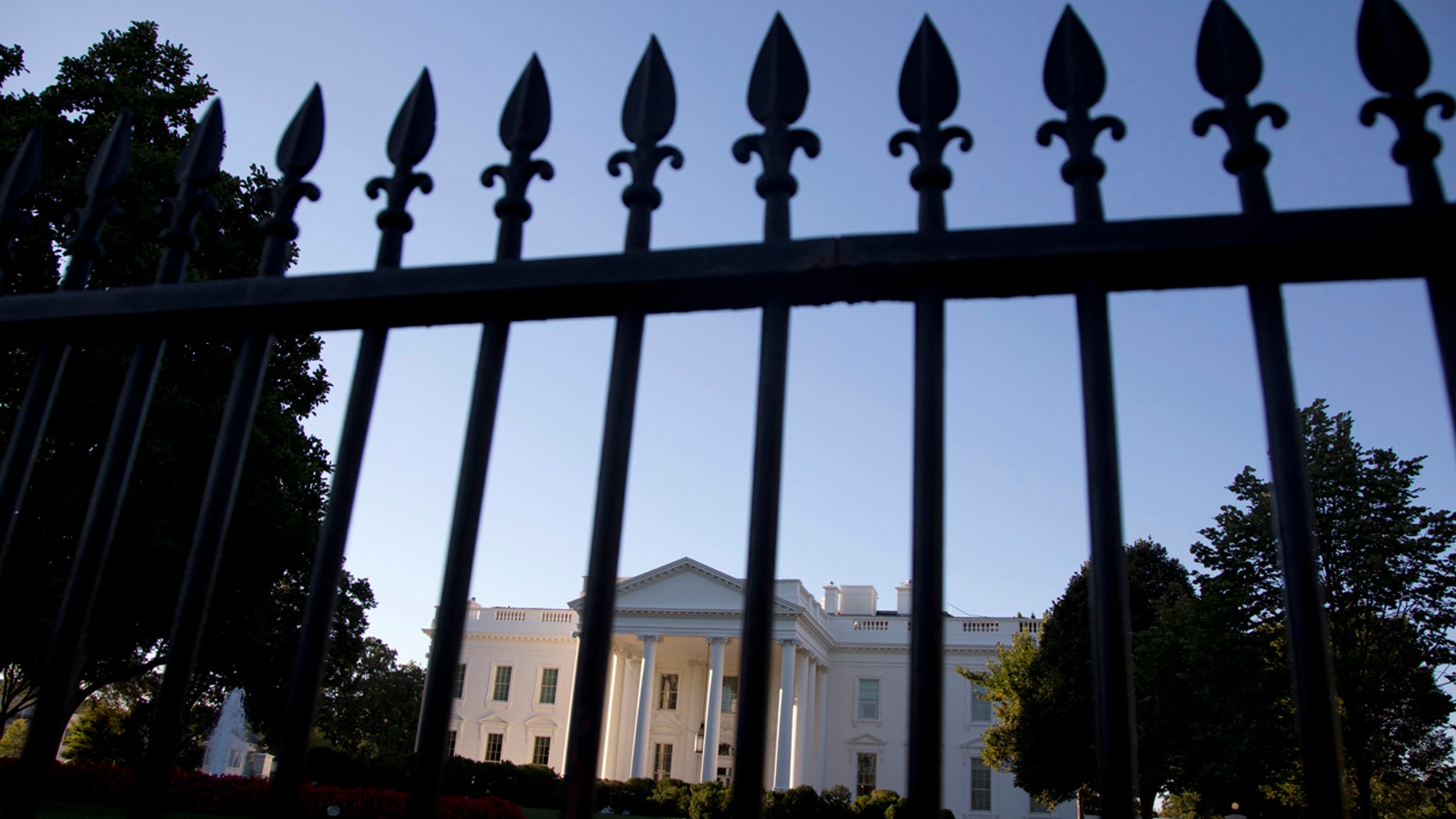 FILE - In this Sept. 22, 2014, file photo, the White House is photographed from Pennsylvania Avenue in Washington.