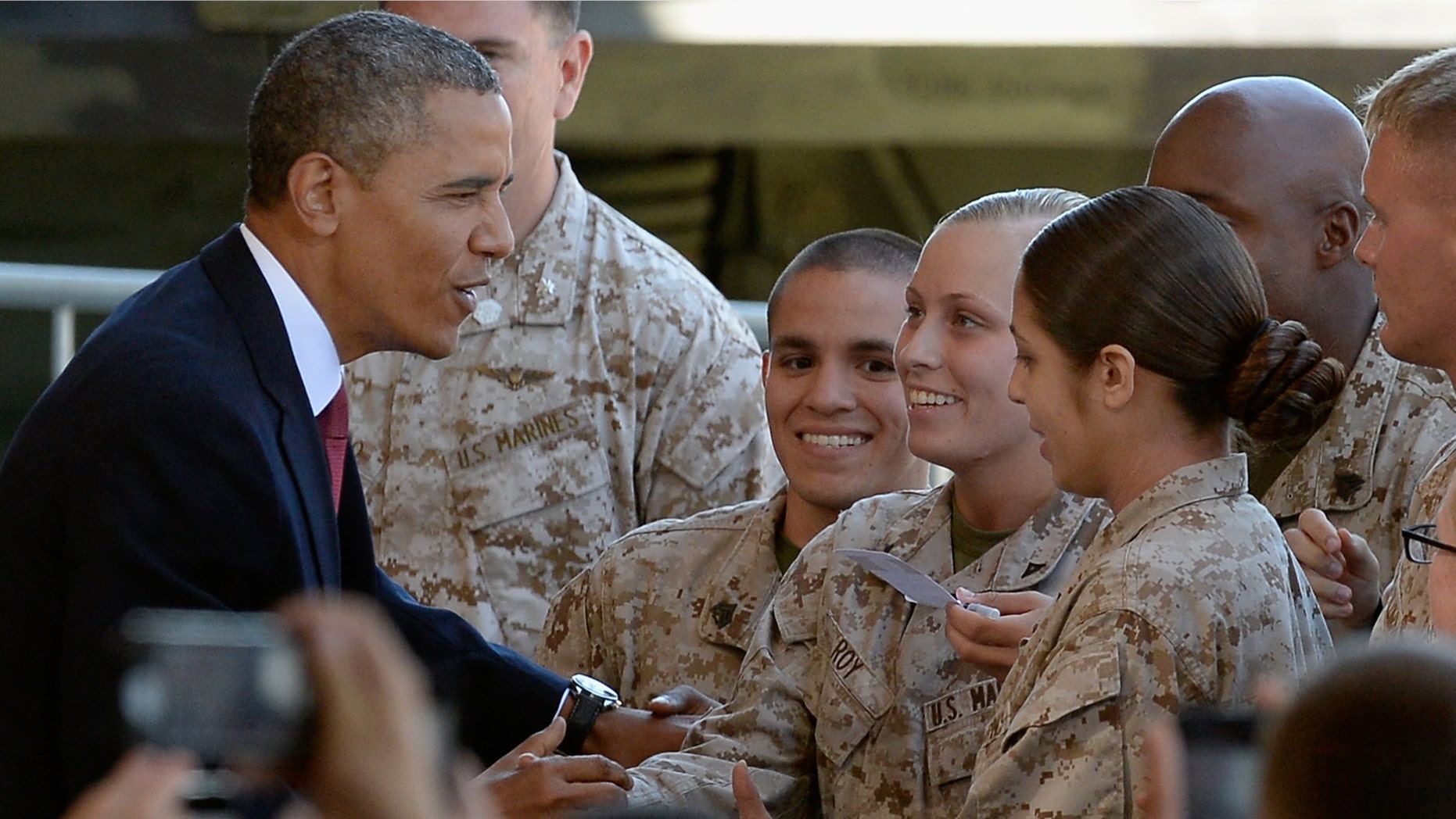 CAMP PENDLETON, CA - AUGUST 07: U.S. President Barack Obama greets Marines after speaking at Camp Pendleton Marine Corps base visiting troops and their families to thank them for their service on August 7, 2013 in Camp Pendleton, California. Obama announced today that he canceled a planned meeting with Russian President Vladimir Putin in Moscow amid tensions over National Security Agency leaker Edward Snowden and other issues. (Photo by Kevork Djansezian/Getty Images)