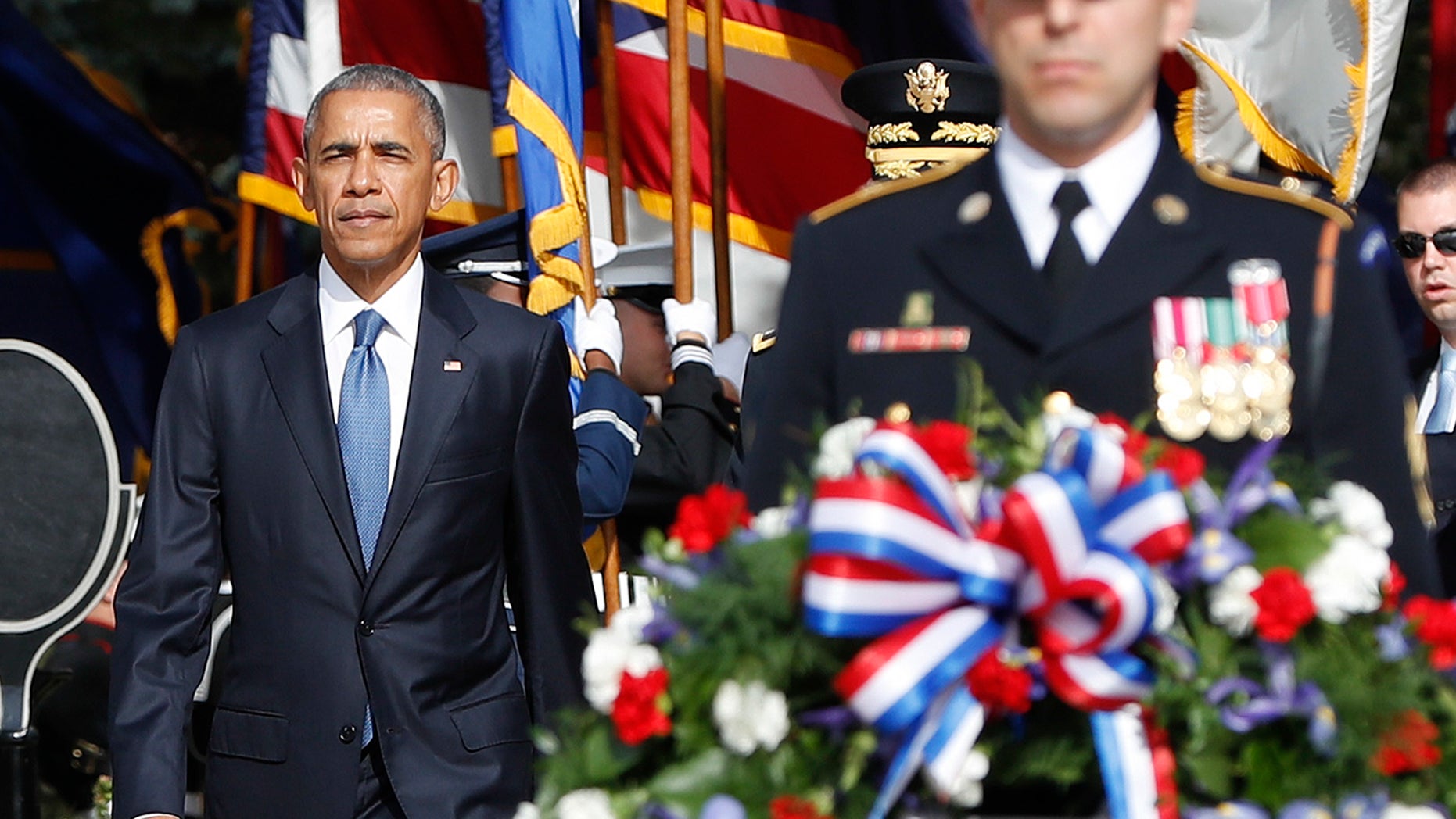 President Barack Obama arrives to lay the wreath at the Tomb of the Unknowns, on Veterans Day, Friday, Nov. 11, 2016, at Arlington National Cemetery in Arlington, Va.