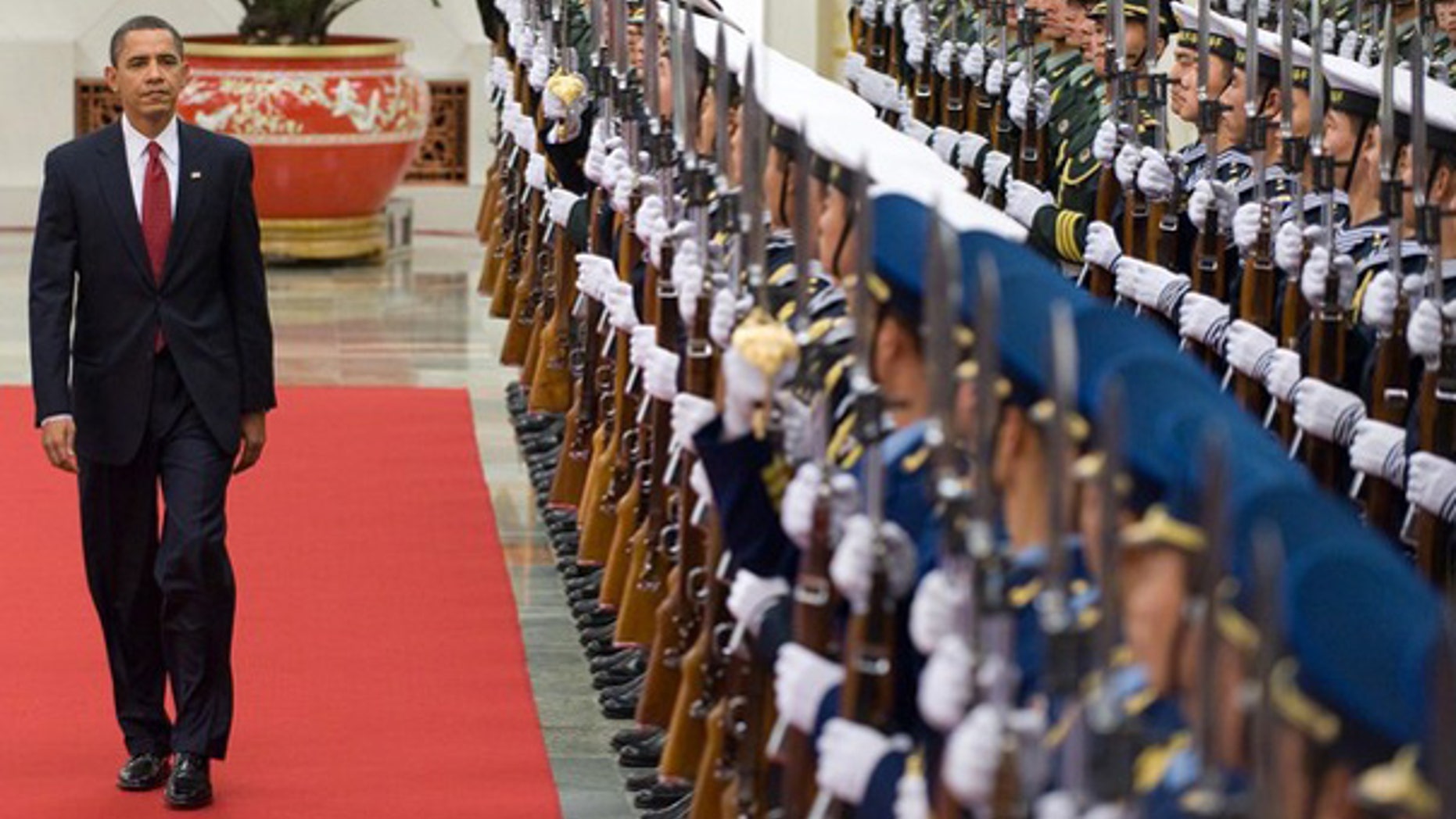 Nov. 17: President Barack Obama walks past an honor guard at a welcoming ceremony at the Great Hall of the People prior to meetings in Beijing. (AFP)