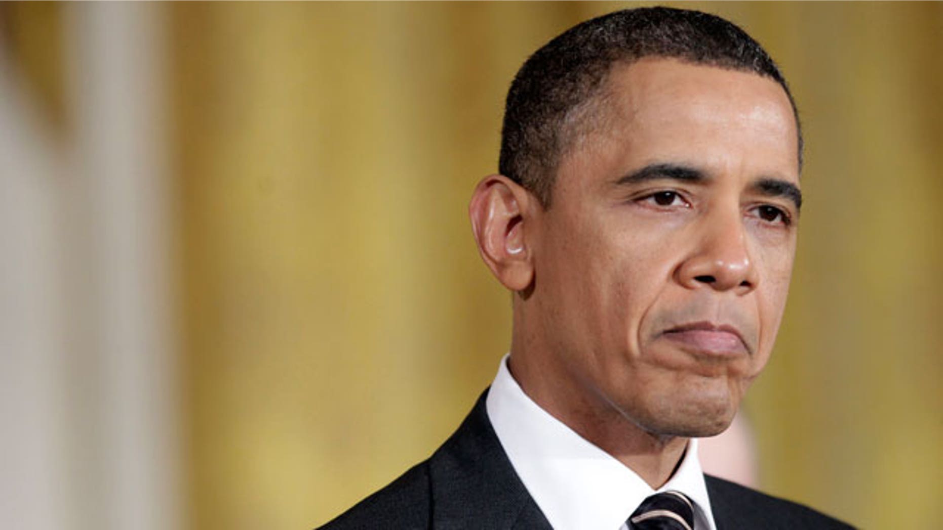 President Barack Obama pauses as he speaks on America's Great Outdoors initiative during a ceremony in the East Room of the White House in Washington, Wednesday, Feb. 16, 2011. (AP)