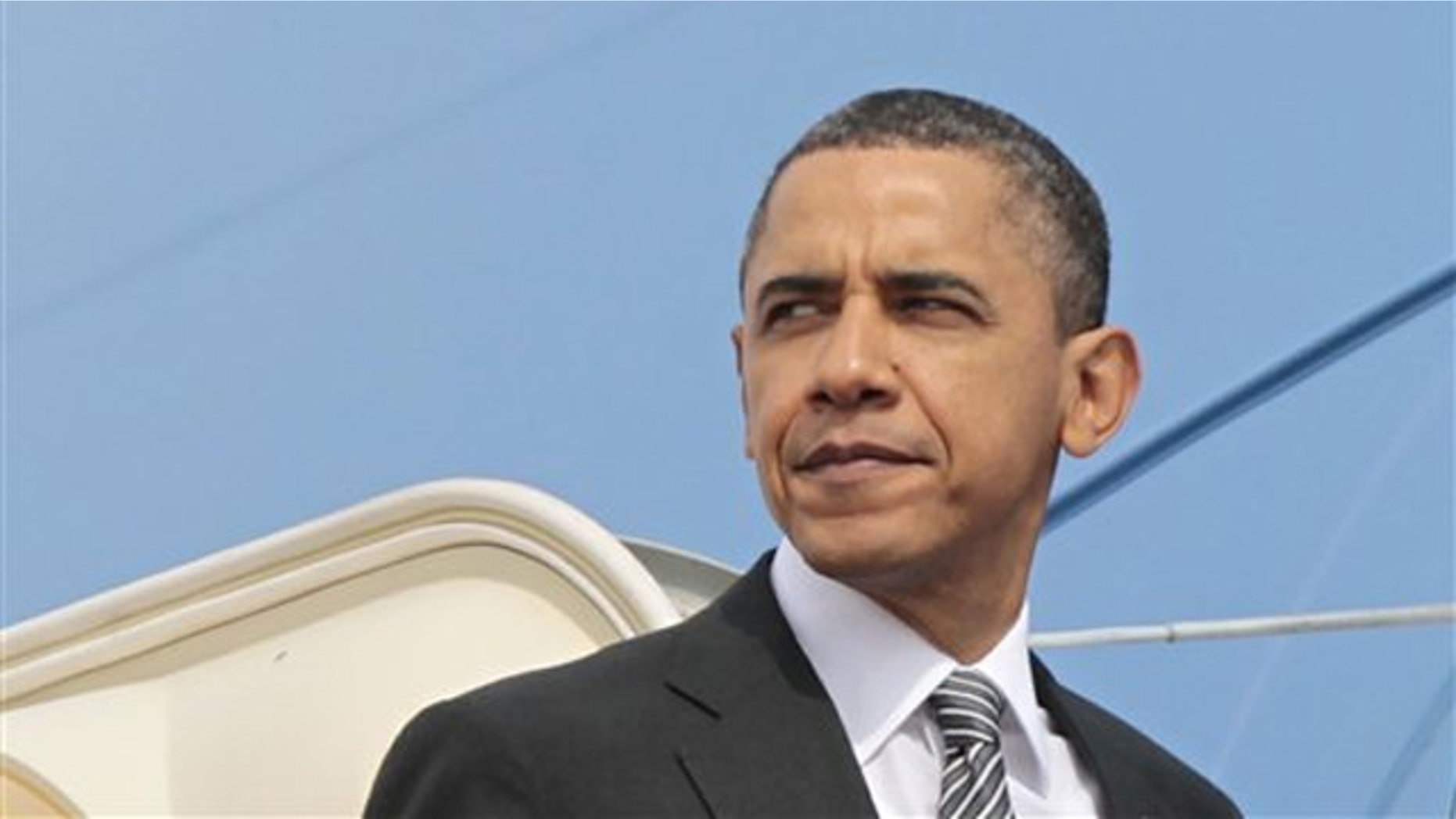 President Obama prepares to board Air Force One before his departure from Andrews Air Force Base March 8.