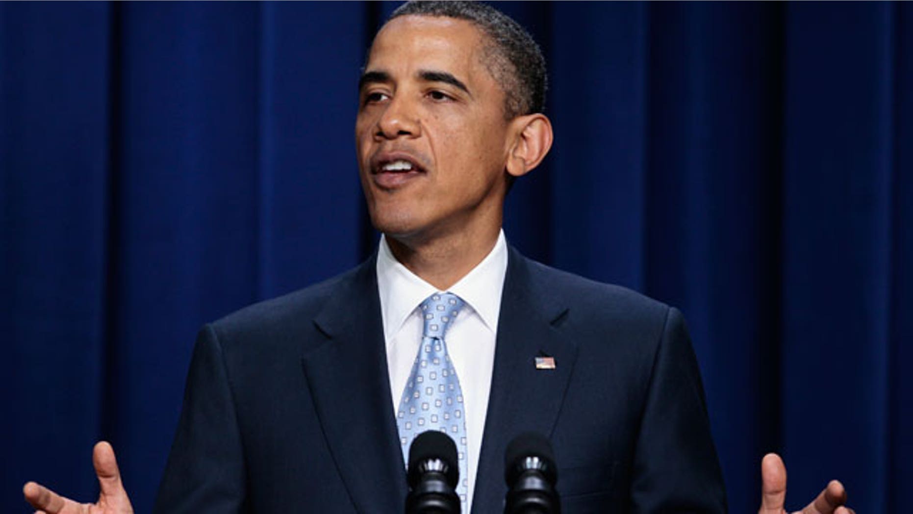 President Barack Obama speaks to military fathers and their children for a screening of Disney/Pixar movie 'Cars 2' in the South Court Auditorium of the Eisenhower Executive Office Building on the White House complex, Wednesday, June 15, 2011. (AP)