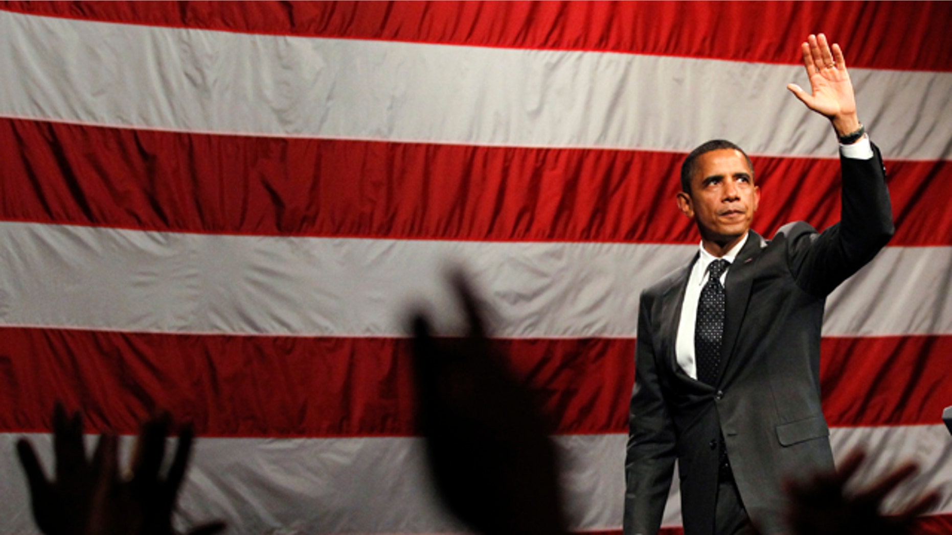 Sept. 26: President Barack Obama waves after a Democratic fundraiser at the House of Blues in West Hollywood, Calif.