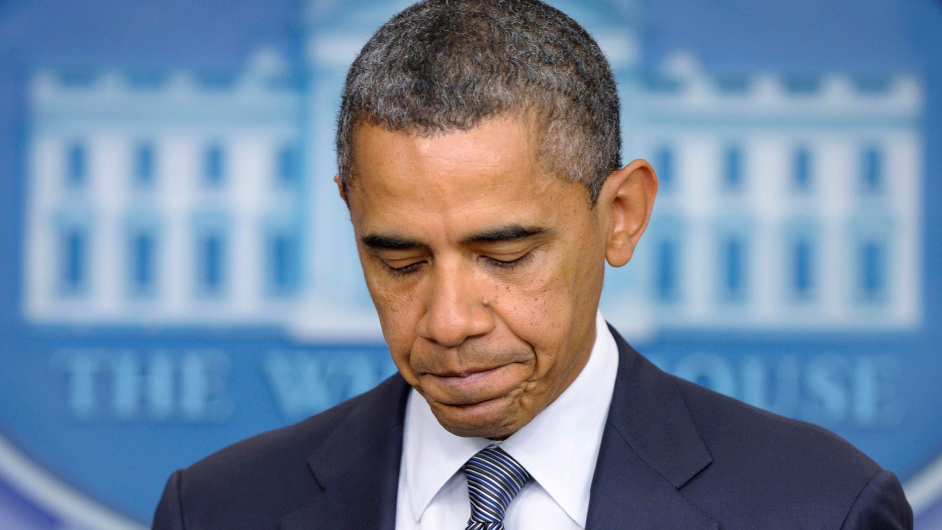 President Barack Obama concludes his remarks in the briefing room of the White House in Washington, Friday, Oct. 21, 2011