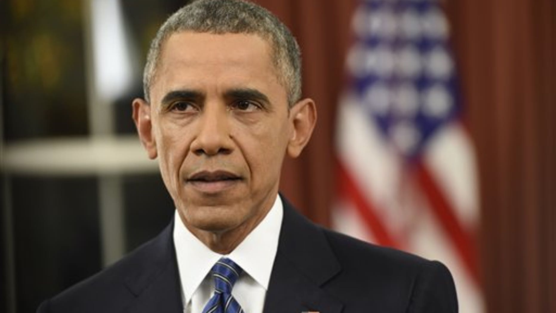 President Barack Obama addresses the nation from the Oval Office at the White House in Washington, Sunday night, Dec. 6, 2016. The president announced no significant shift in U.S. strategy and offered no new policy prescriptions for defeating the Islamic State, underscoring both his confidence in his current approach and the lack of easy options for countering the extremist group. (Saul Loeb/Pool Photo via AP