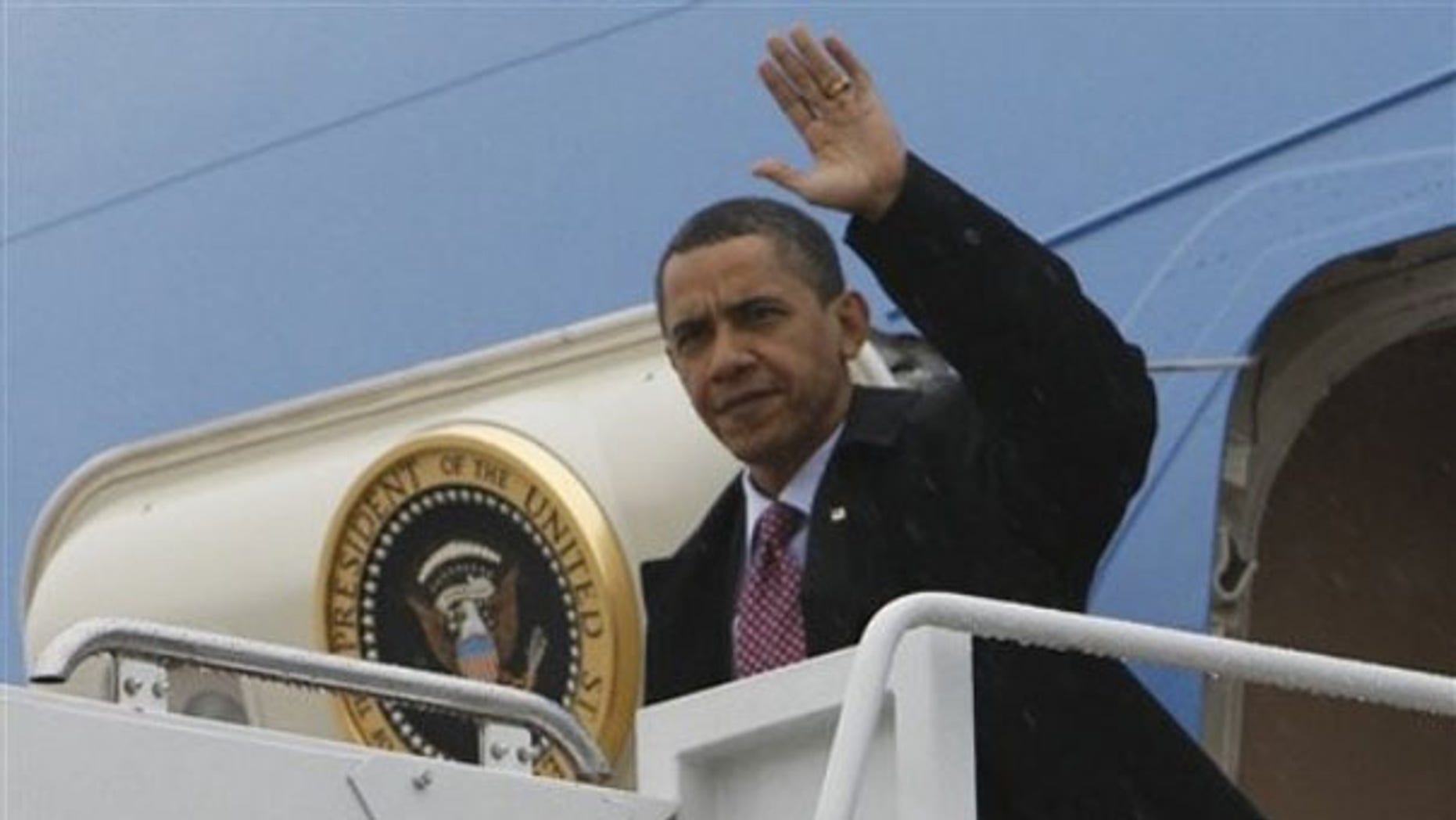President Obama steps off Air Force One at Andrews Air Force Base, Md., after returning from Afghanistan March 29. (AP Photo)