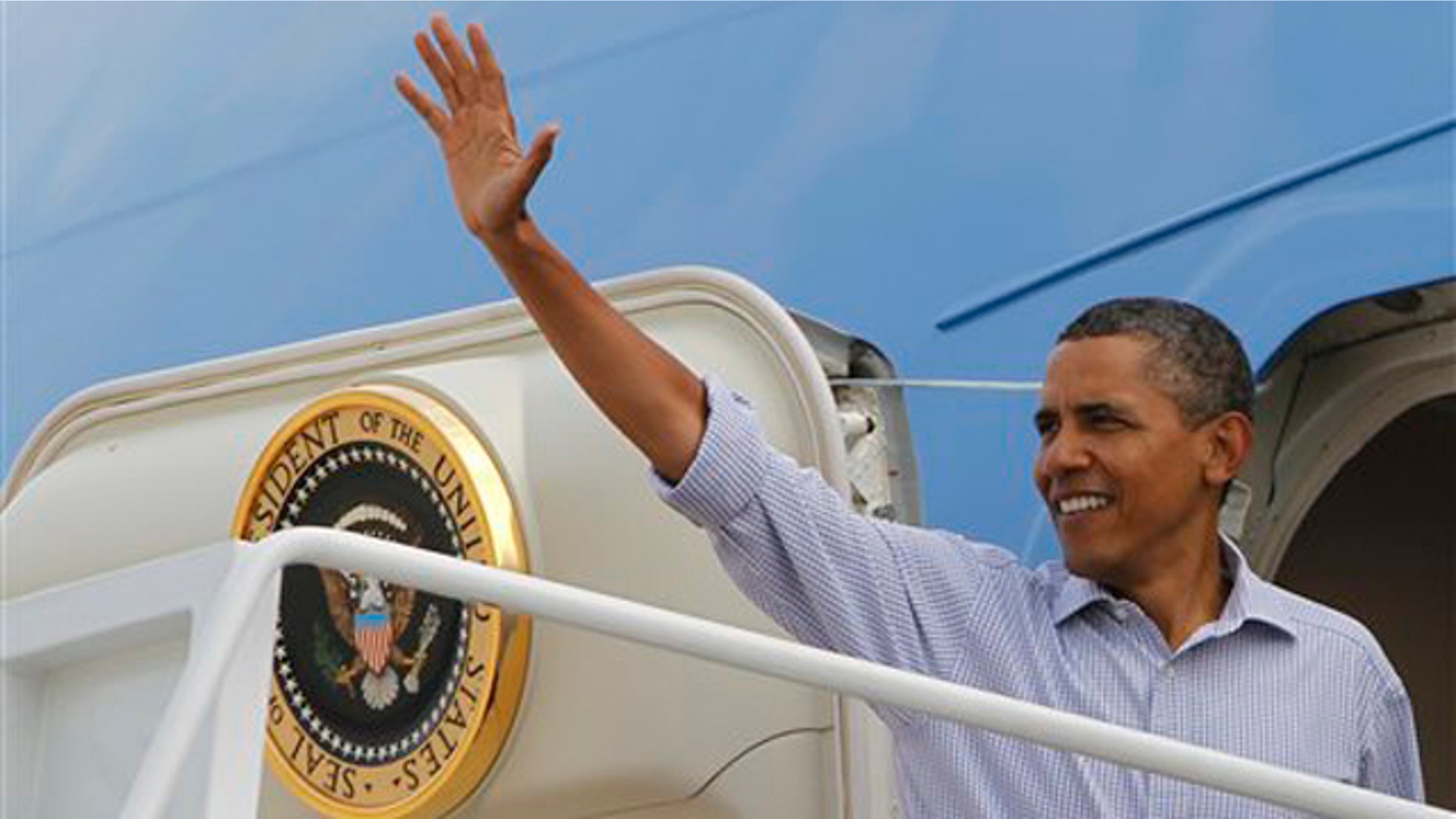 President Obama boards Air Force One at Andrews Air Force Base, Md., as he travels to Paterson, N.J., on Sept. 4.