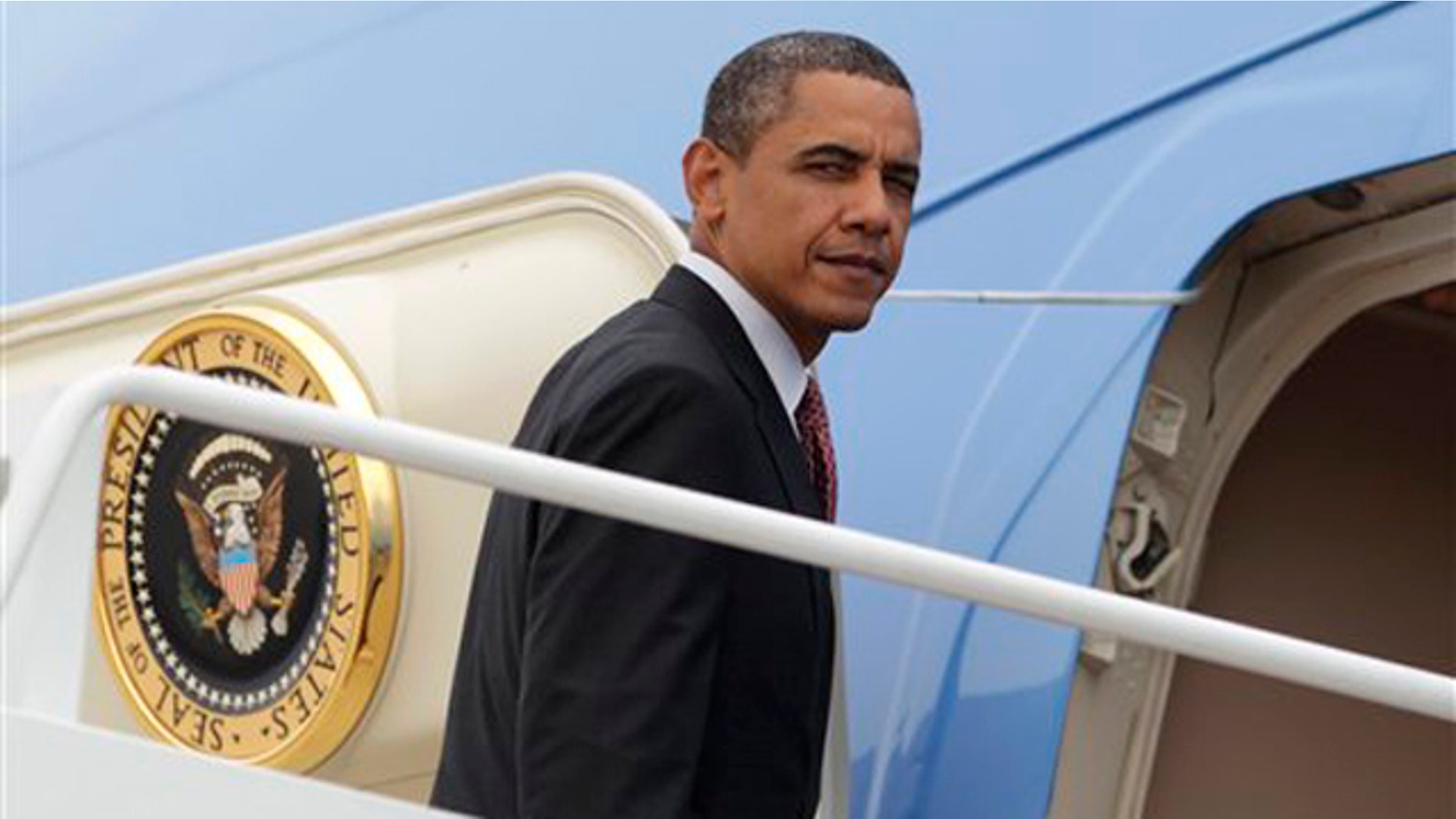 President Obama boards Air Force One at Andrews Air Force Base, Md., June 23 en route to New York.