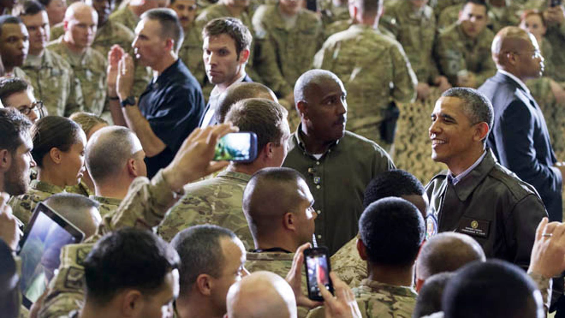 May 25, 2014: President Obama greets troops at Bagram Airfield, north of Kabul, Afghanistan, during an unannounced visit.