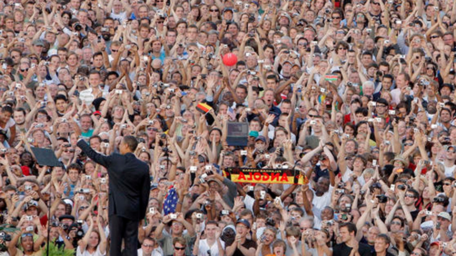 In this July 24, 2008, photo, then-Sen. Barack Obama is seen greeting the crowd in Berlin. (AP Photo)