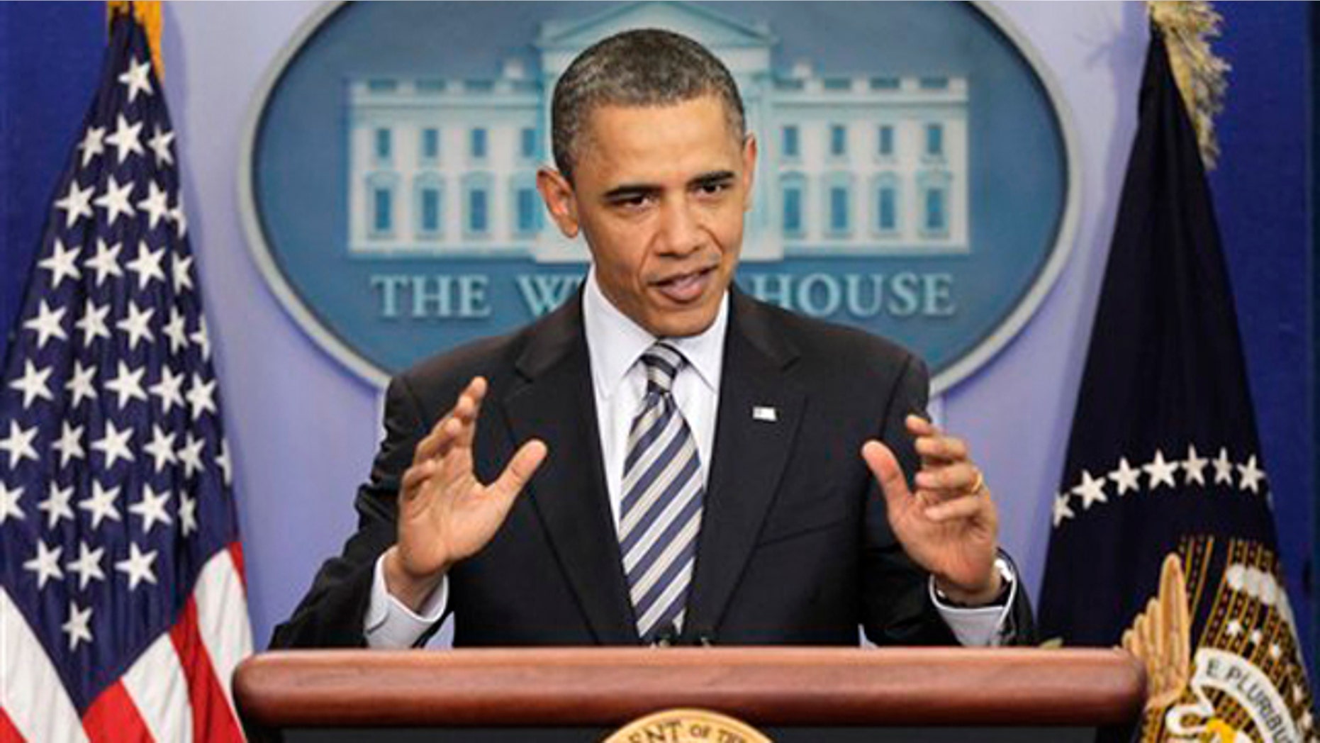 Wednesday: President Obama gestures while speaking to reporters about the controversy over his birth certificate.