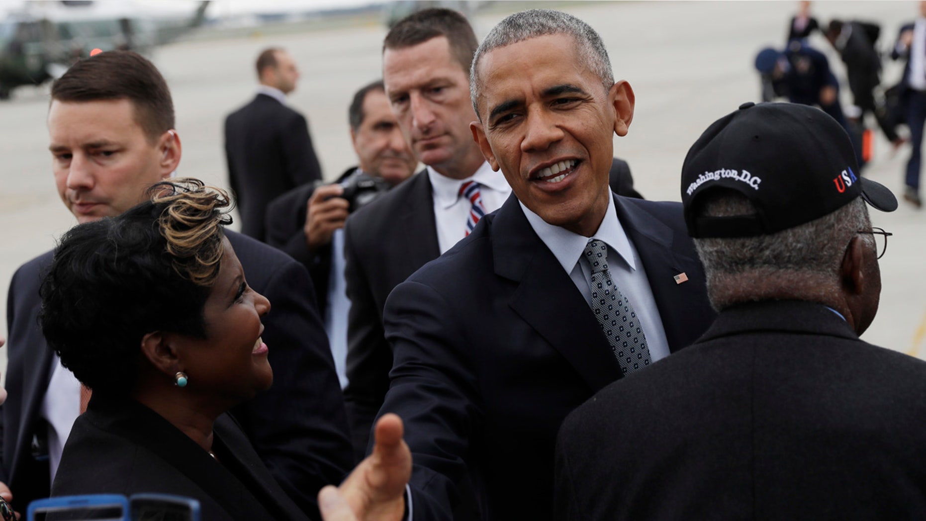 Sept. 28, 2016: President Barack Obama greets people on the tarmac as he arrives on Air Force One at Richmond International Airport, in Richmond, Va.