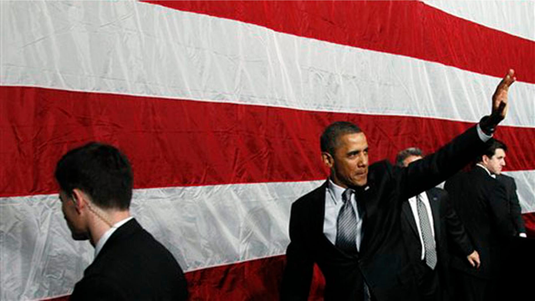 Jan. 11, 2012: President Obama waves after he spoke at a campaign event at the University of Illinois in Chicago.