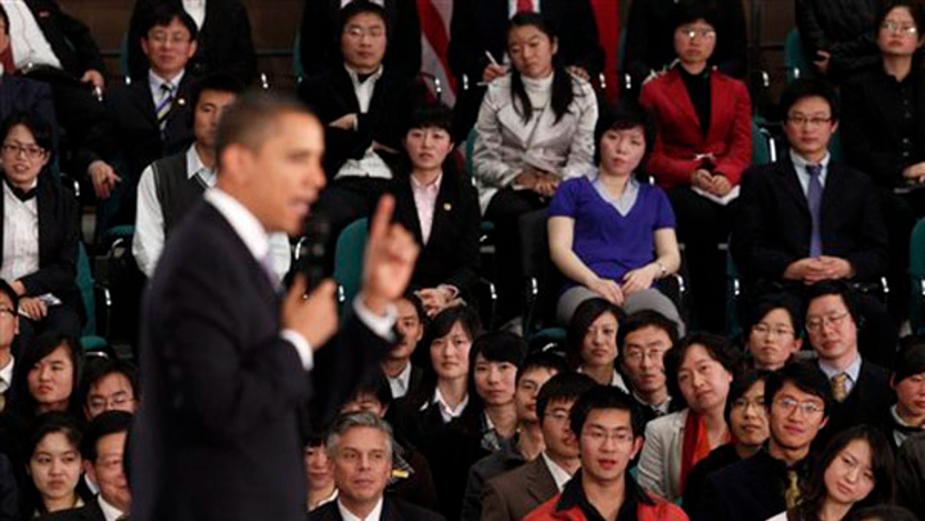 Monday: President Obama speaks at a town hall style event with Chinese youth at the Museum of Science and Technology in Shanghai, China. (AP Photo)