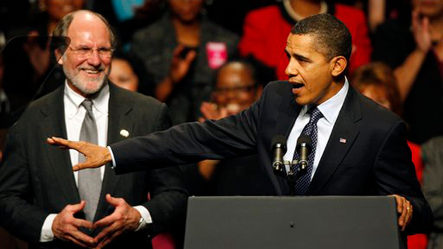Gov. Jon Corzine listens to President Obama at a campaign rally Nov. 1 in Camden, N.J. (AP Photo)