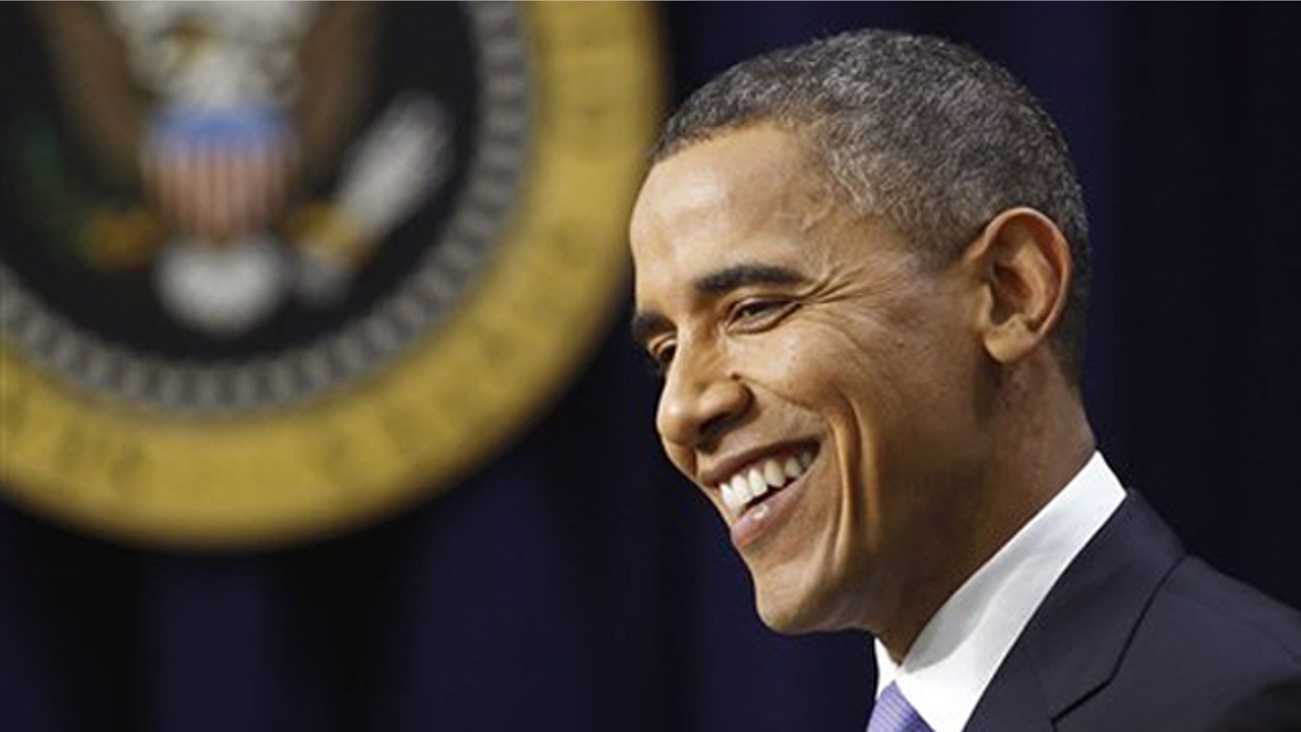 President Obama smiles during a news conference in Washington Dec. 22.