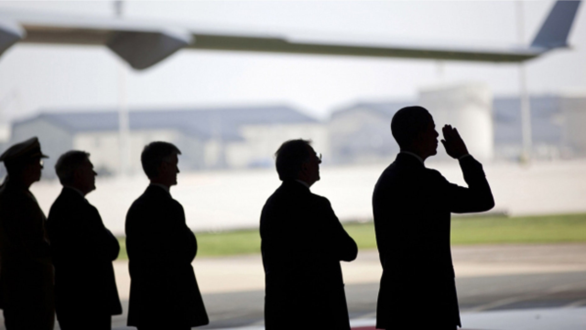 The White House released this picture of President Obama at Dover Air Force Base in Delaware on Aug. 9, 2011, receiving the planes carrying the bodies of the 30 U.S. service members killed when their helicopter was downed by an RPG in Afghanistan.