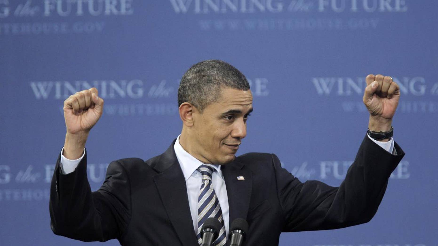 President Barack Obama gestures during his speech at Northern Michigan University in Marquette, Mich., Thursday, Feb. 10, 2011. (AP Photo/Carlos Osorio)