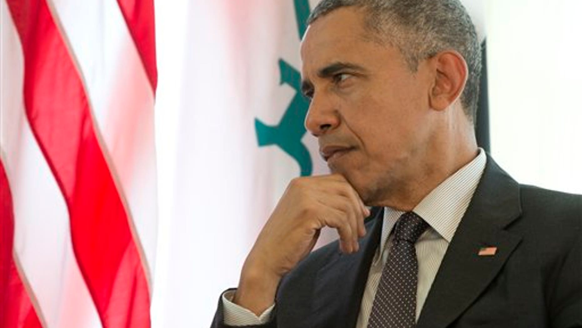 FILE -- June 8, 2015: President Obama pauses as he participates in a bilateral meeting with Iraqi Prime Minister Haider al-Abadi during the G-7 summit in Schloss Elmau hotel near Garmisch-Partenkirchen, southern Germany. (AP Photo/Carolyn Kaster)
