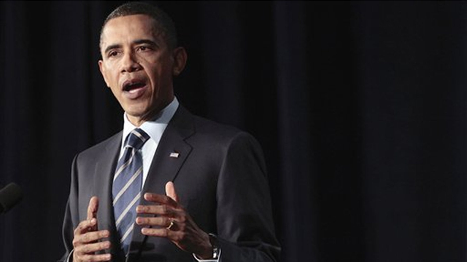 President Obama outlines his fiscal policy during an address at George Washington University in Washington April 13.