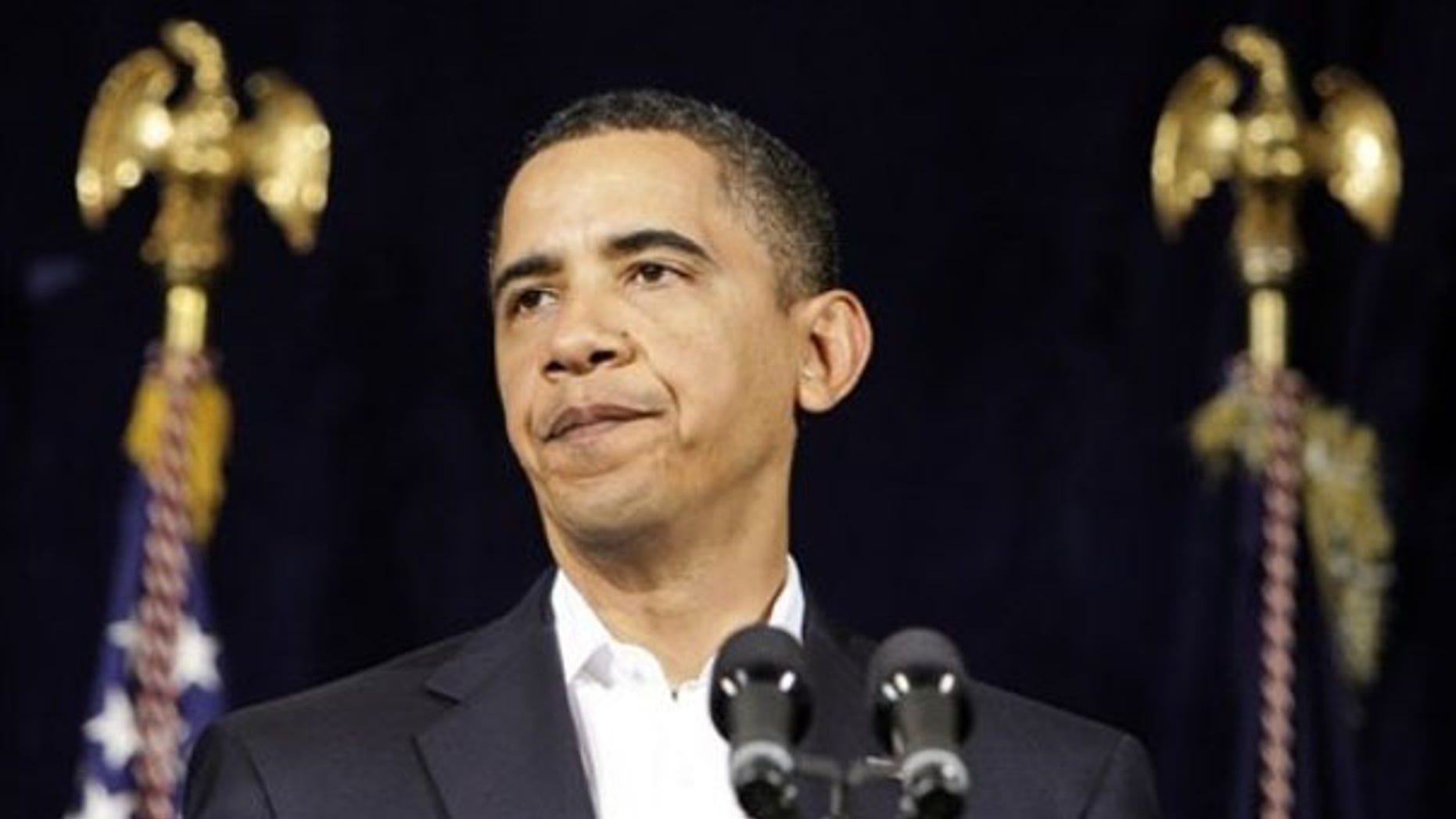 President Obama speaks to reporters Dec. 28 at the Marine Corps Base Hawaii at Kaneohe Bay. (AP Photo)