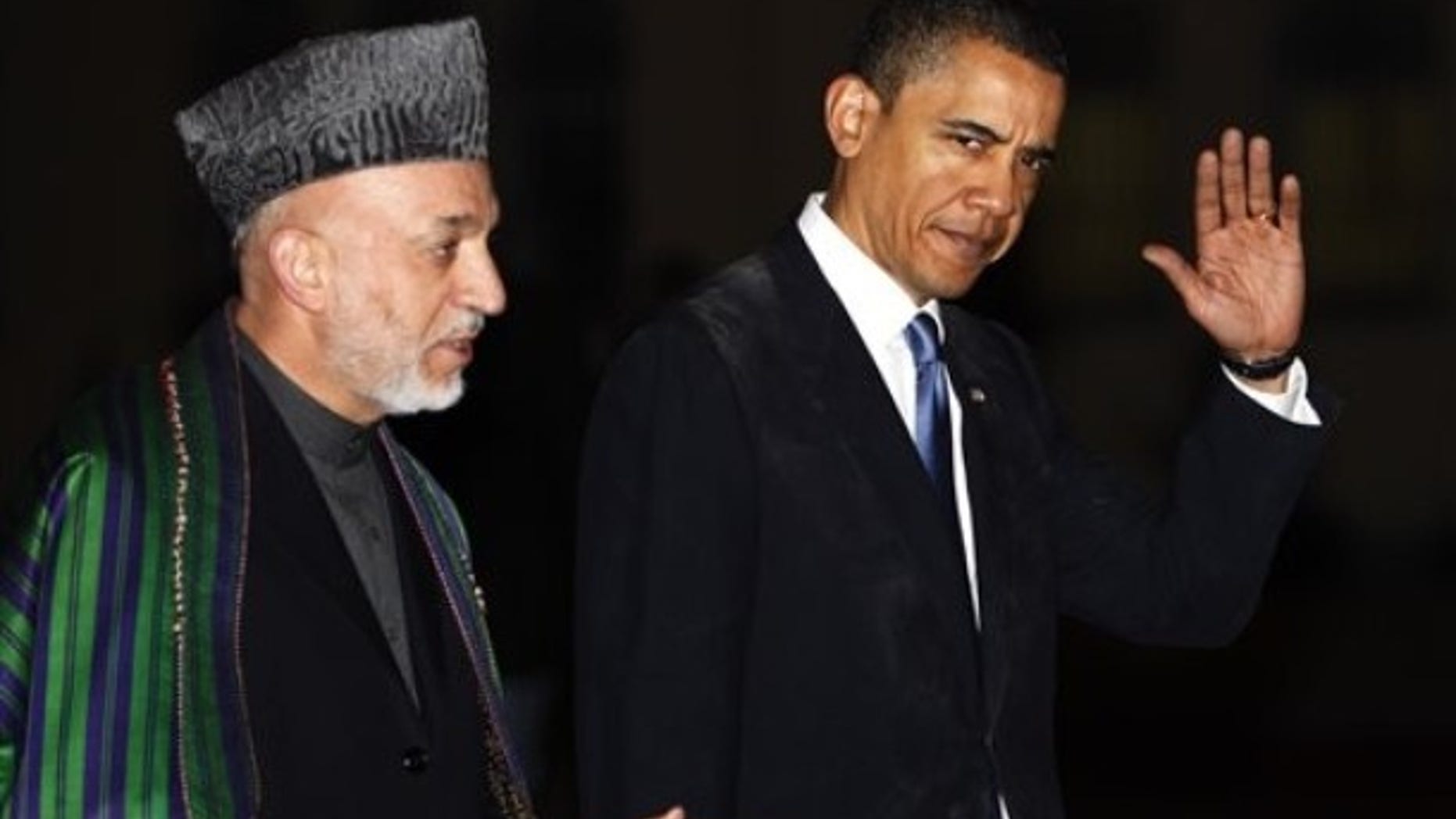 March 28, 2010: President Obama meets with Afghan President Hamid Karzai, left, at the presidential palace in Kabul, Afghanistan.