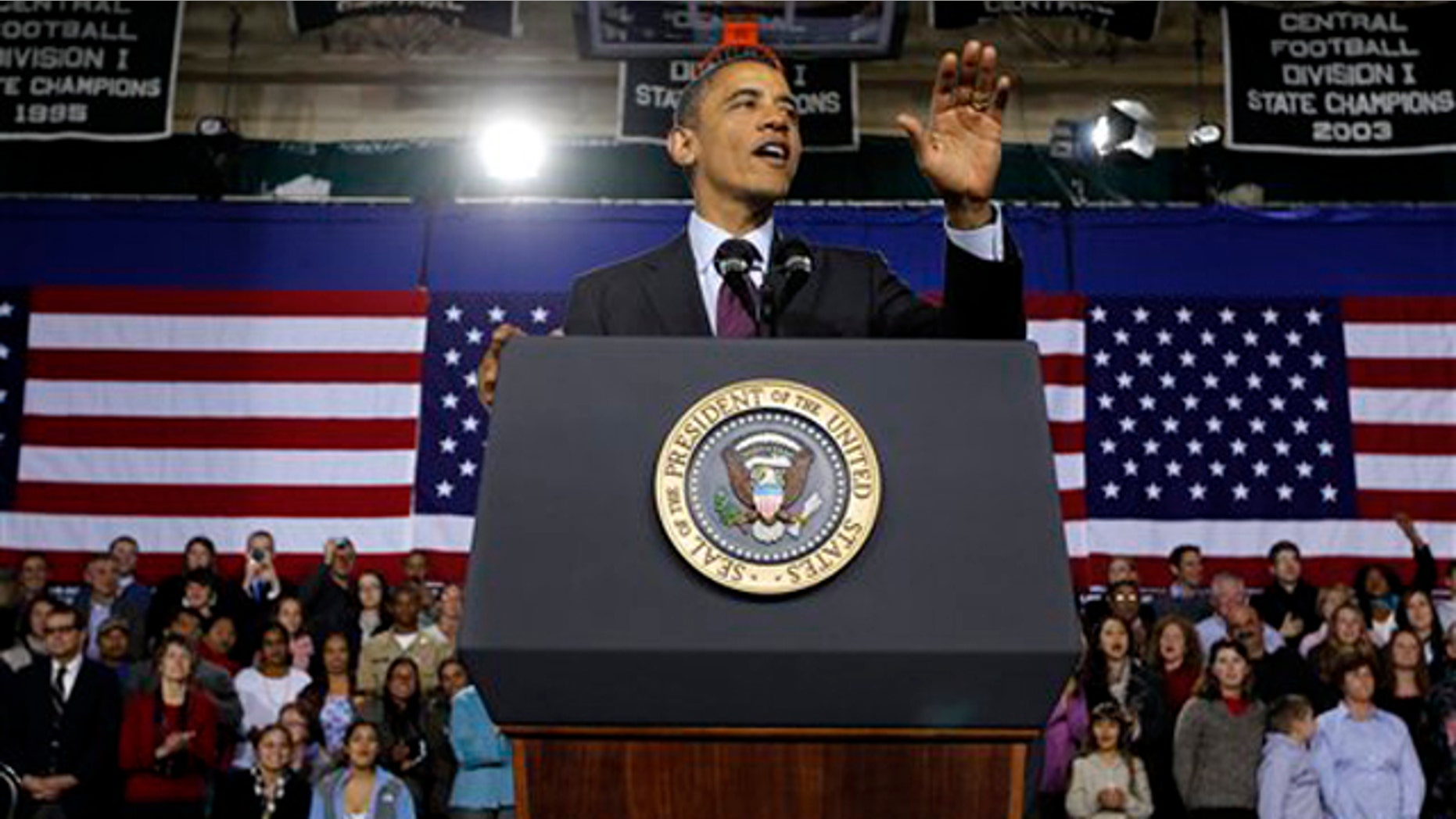 Nov. 22, 2011: President Obama gestures during a speech at Manchester High School Central in Manchester, N.H.