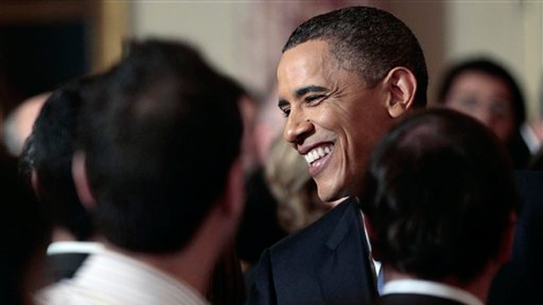 President Obama greets members of the audience after delivering a policy address on the Middle East at the State Department in Washington May 19.