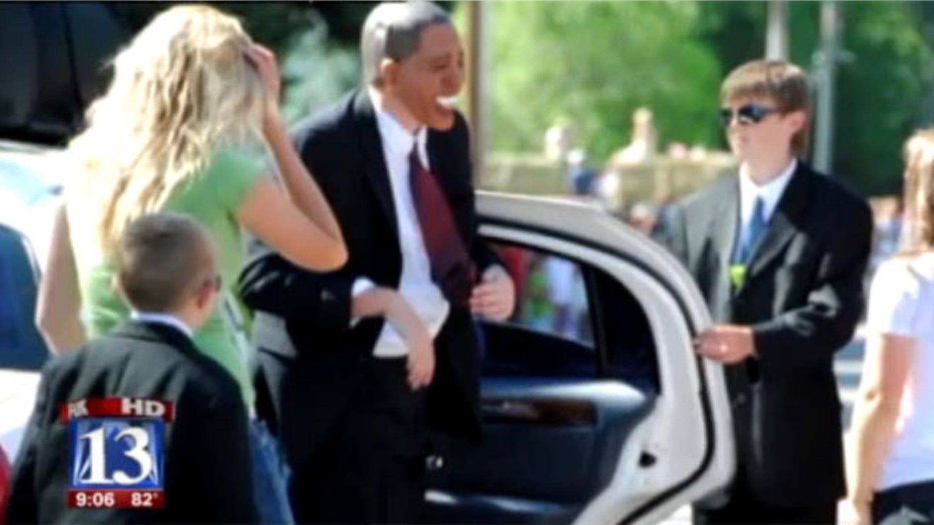 An actor posing as President Obama is shown at a parade in Huntsville, Utah.