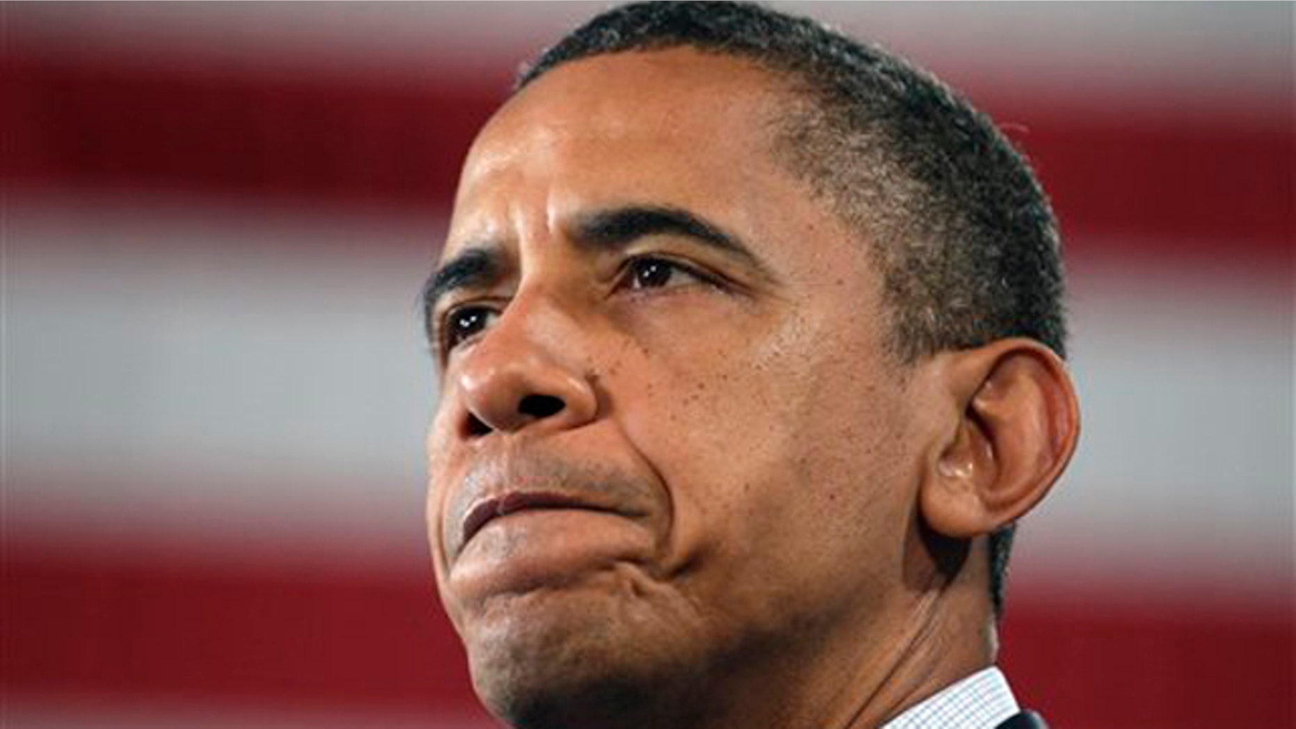 Tuesday: President Obama pauses as he speaks during a Rural Economic Forum in Peosta, Iowa.