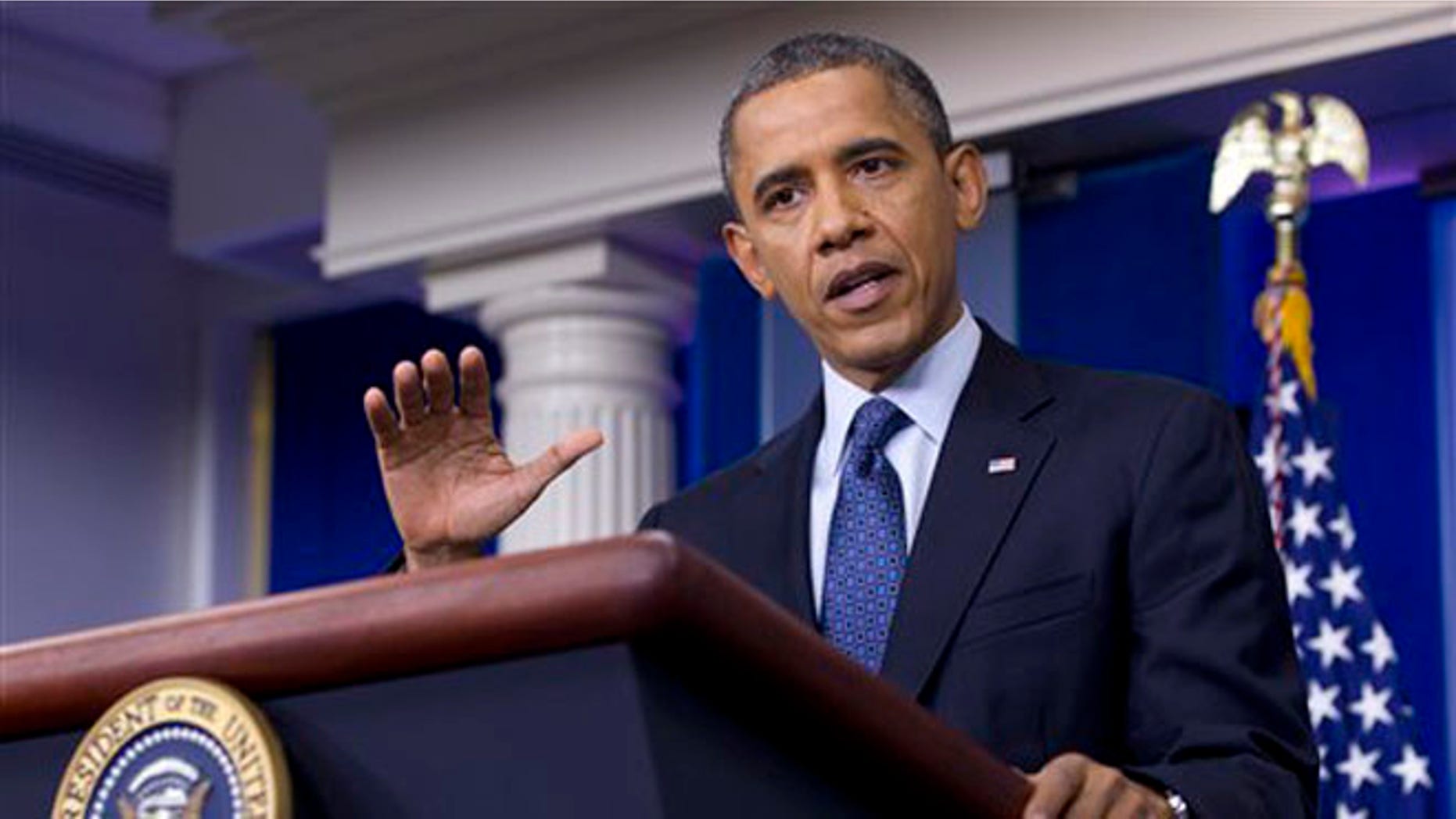 FILE: June 8, 2012: President Obama talks at a press conference inside the White House Briefing Room, in Washington.