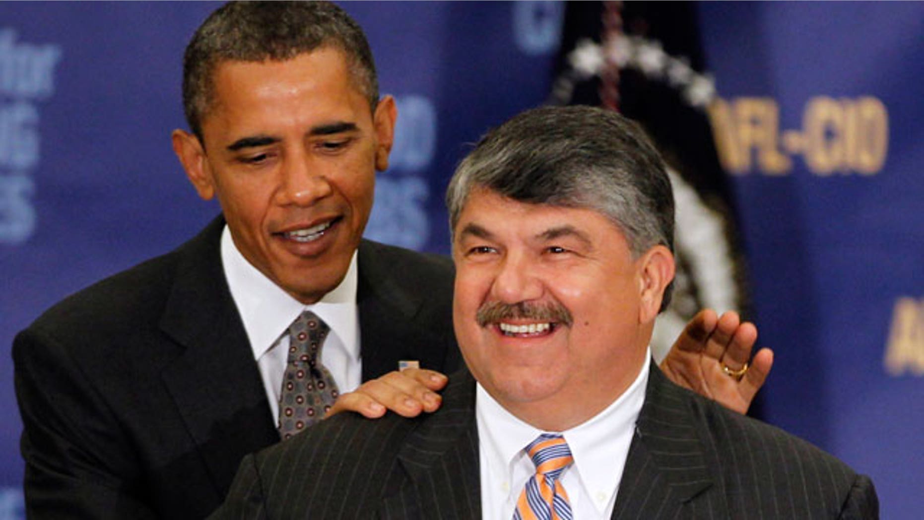 In this Aug. 4, 2010, file photo President Barack Obama stands with AFL-CIO Presidet Richard Trumka after speaking about jobs and the economy in Washington.