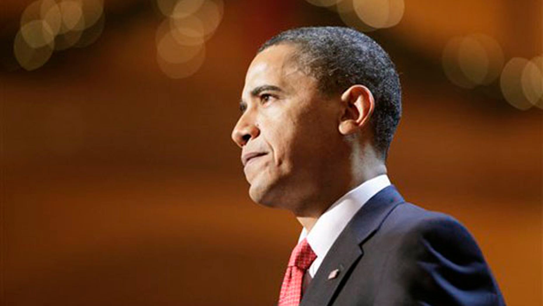 Sunday: President Obama speaks at a Christmas event held at the National Building Museum in Washington. (AP Photo)