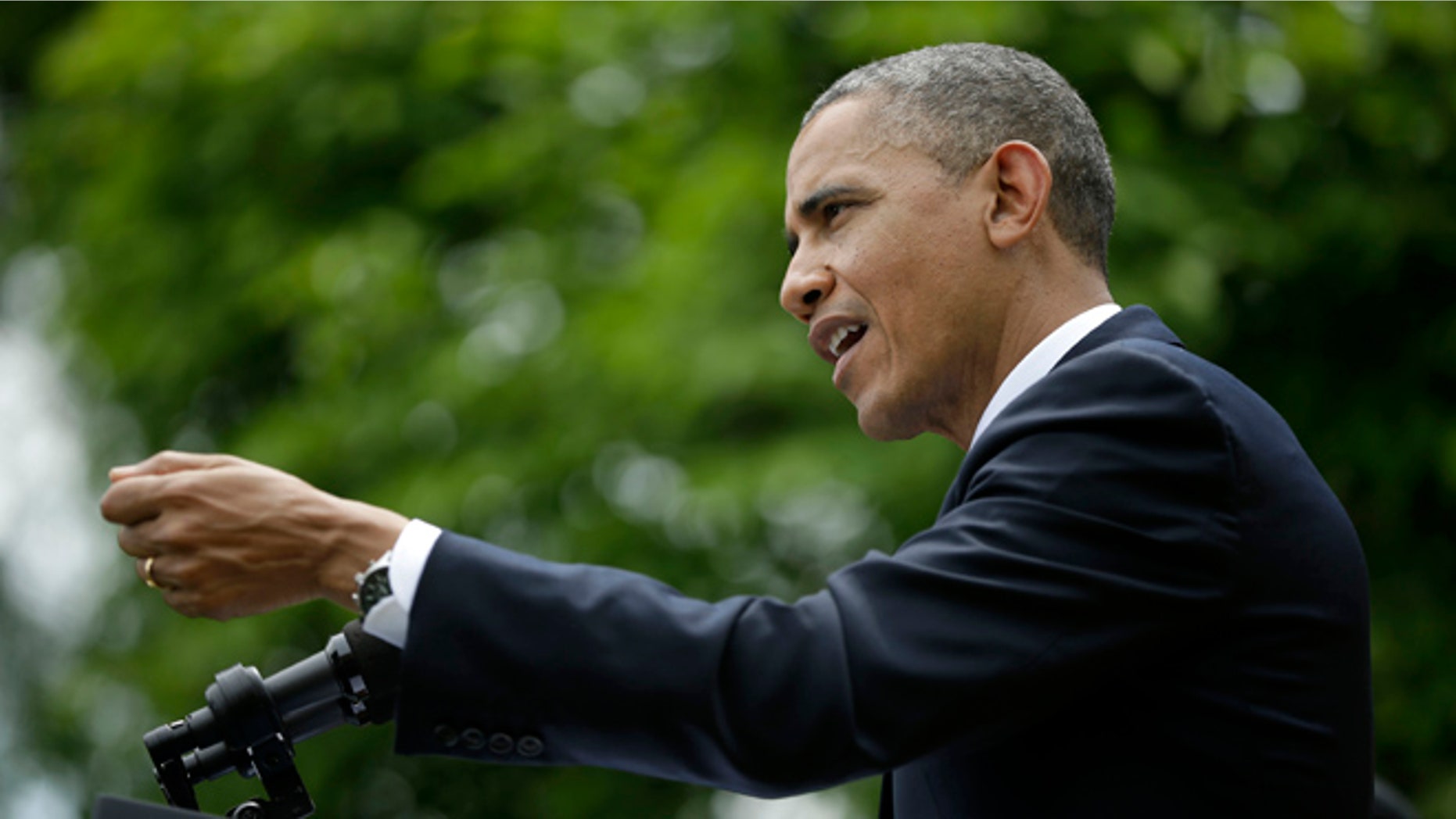 May 16, 2013: President Obama gestures as he answers questions during his joint news conference with Turkey's Prime Minister Recep Tayyip Erdogan in the Rose Garden of the White House.