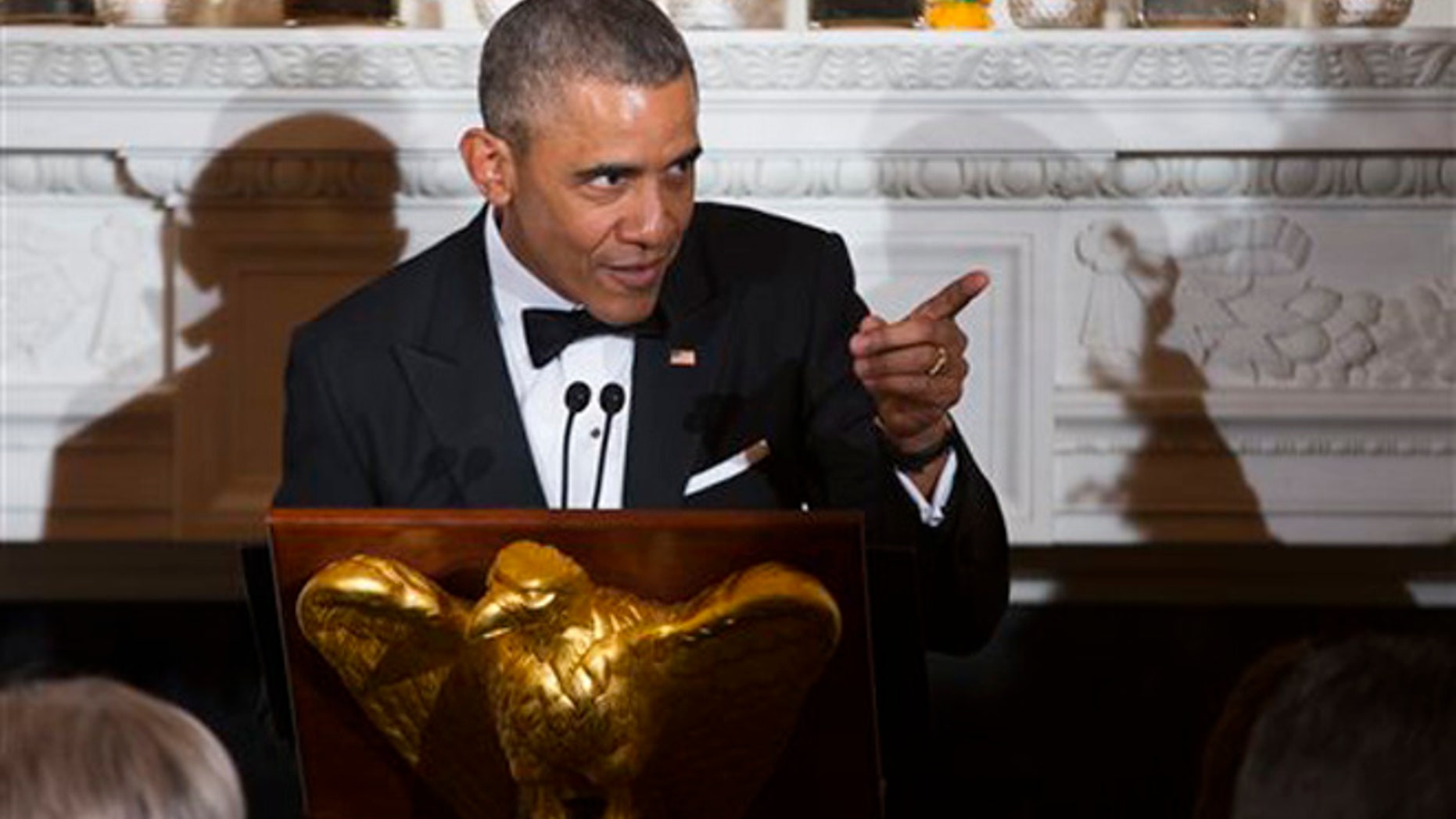President Barack Obama delivers remarks during a National Governors Association dinner in the State Dining room of the White House, on Sunday, Feb. 21, 2016, in Washington. (AP Photo/Evan Vucci)