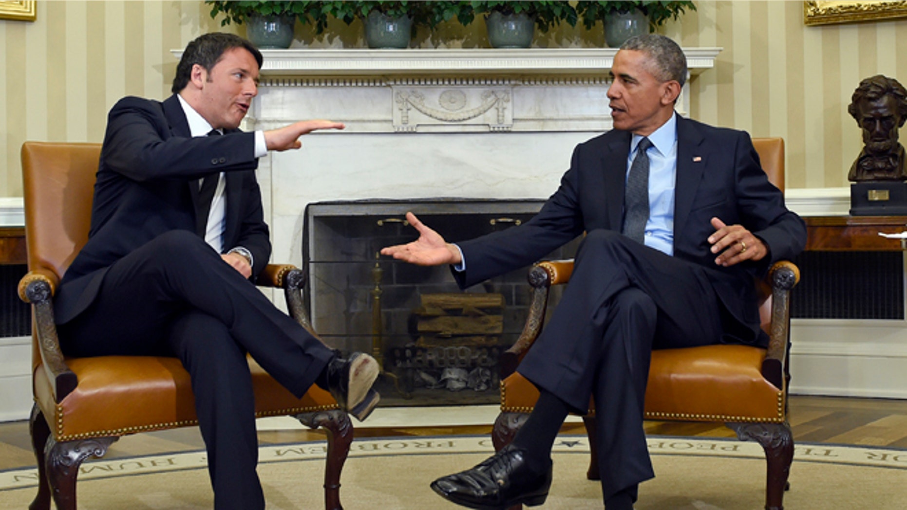 April 17, 2015: President Obama reaches to shake hands with Italian Prime Minister Matteo Renzi in the Oval Office.
