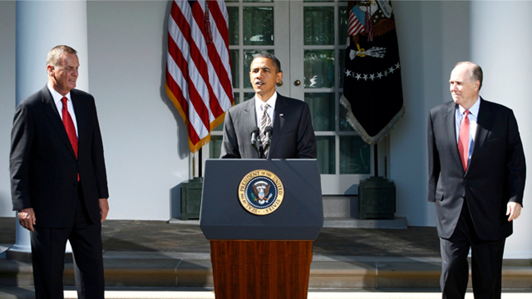 Oct. 8, 2010: Obama stands with outgoing National Security Adviser James Jones, left, and his replacement, Tom Donilon, in the Rose Garden of the White House.