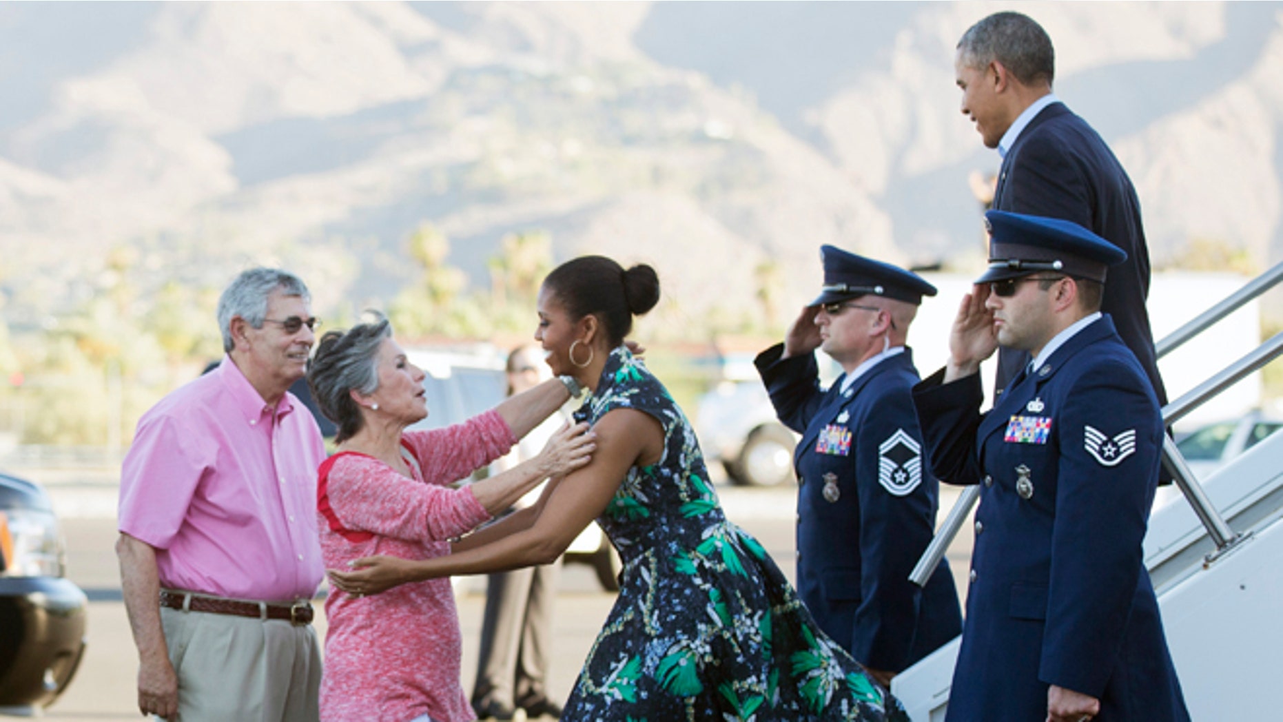 June 13, 2014: President Barack Obama and first lady Michelle Obama, are greeted on the tarmac by Sen. Barbara Boxer, D-Calif., second from left, and her husband Stewart Boxer, left, as they arrive in Palm Springs, Calif. (AP)